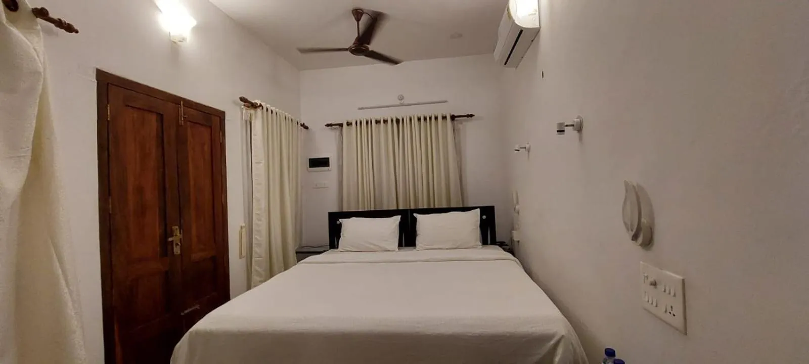 Bed in The Marine Pride Beach Resort & Spa