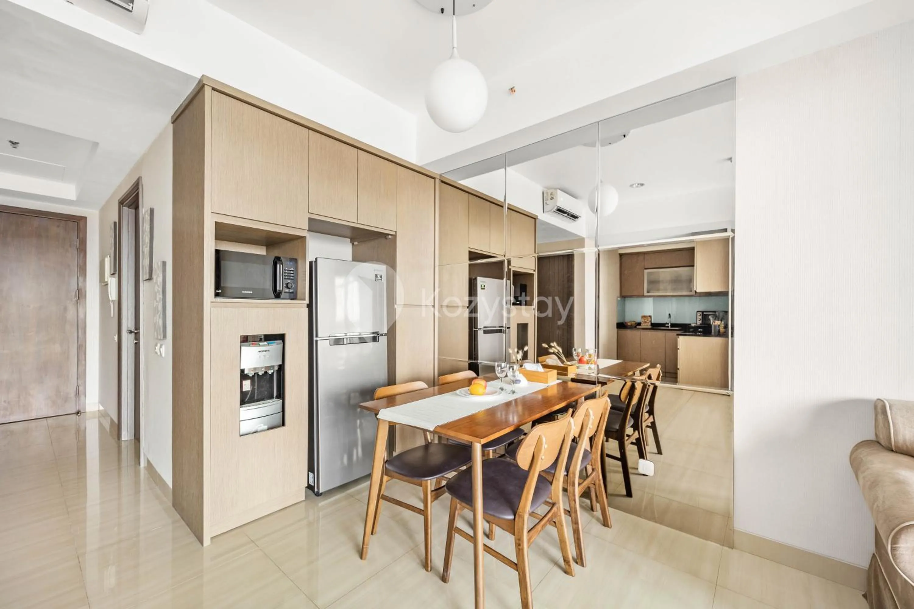 Dining area in Soleil by Kozystay - Kemang