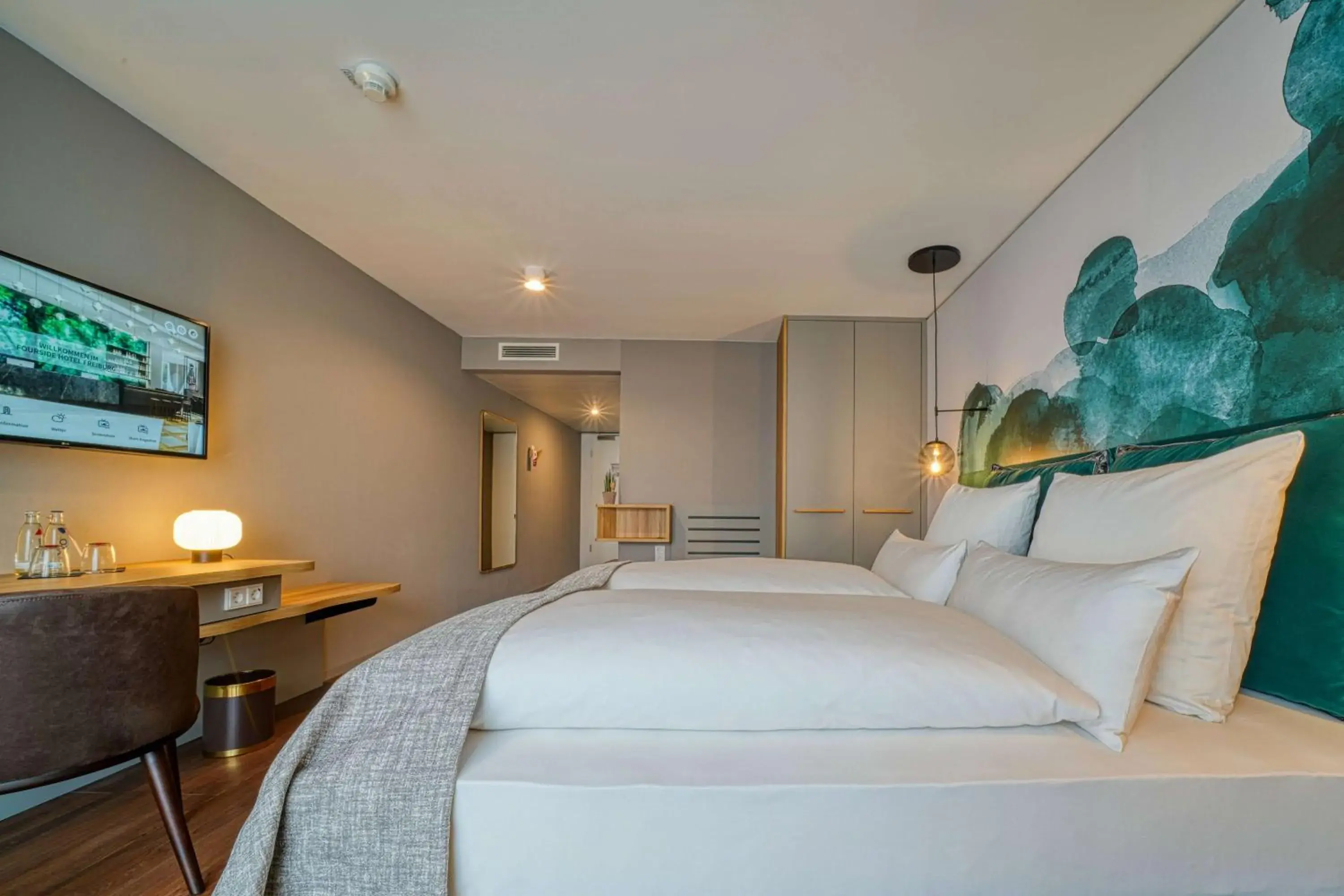 Photo of the whole room, Bed in Vienna House Easy by Wyndham Freiburg City Photo of the whole room, Bed in Vienna House Easy by Wyndham Freiburg City