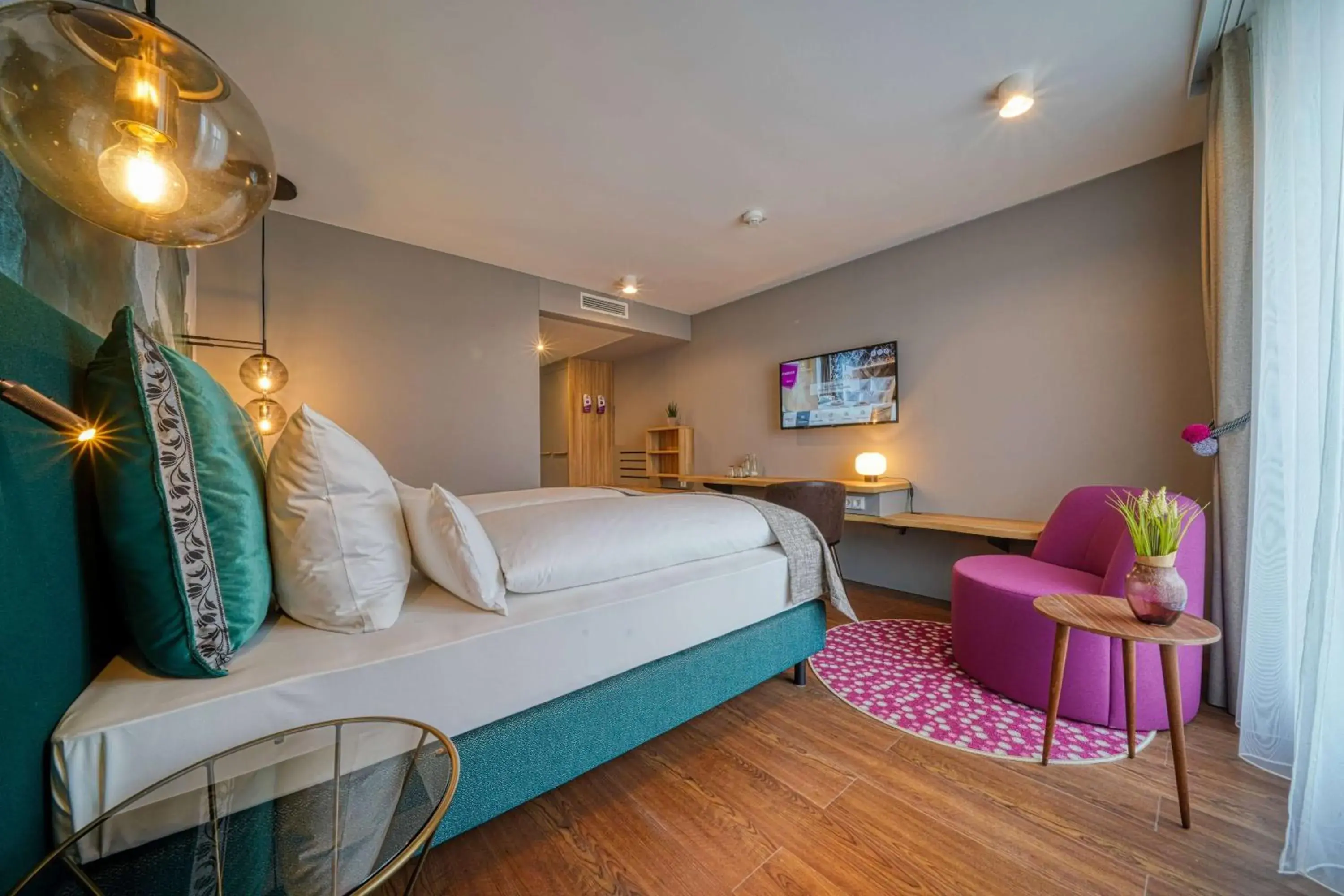 Photo of the whole room, Bed in Vienna House Easy by Wyndham Freiburg City Photo of the whole room, Bed in Vienna House Easy by Wyndham Freiburg City