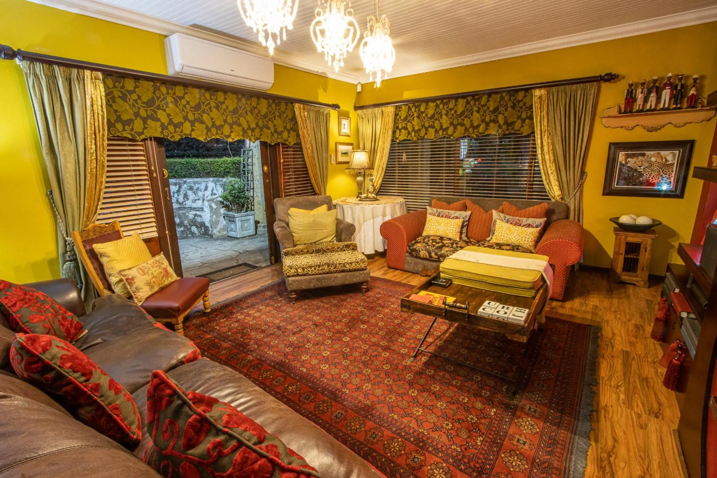 Communal lounge/ TV room in The Tuscan Garden