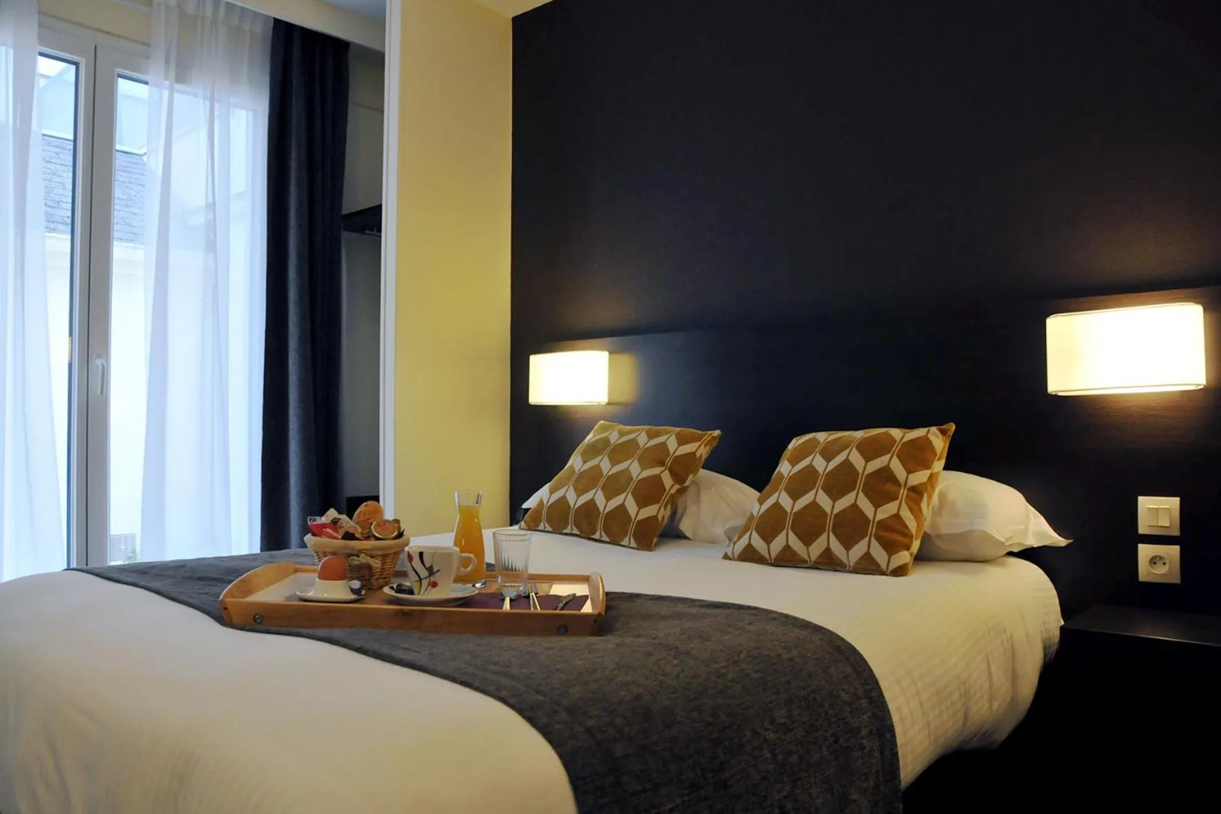 Bed in Hôtel Des Quatrans