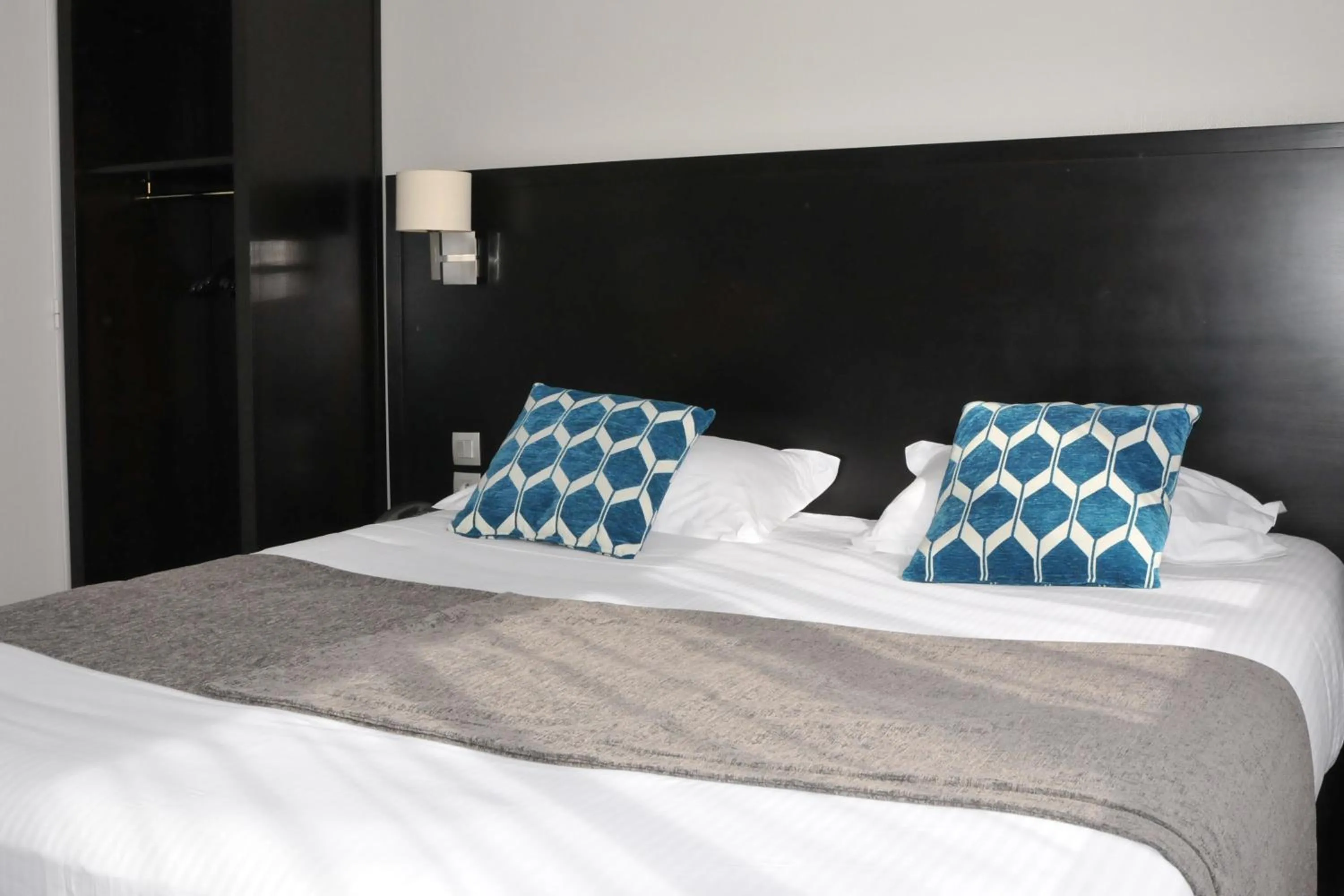 Bed in Hôtel Des Quatrans