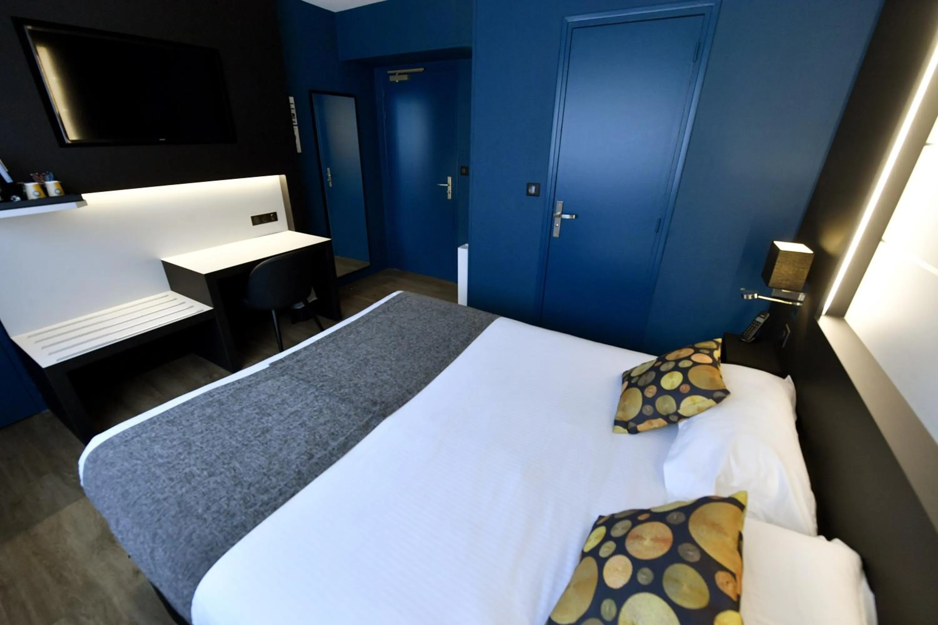 Bed in Hôtel Des Quatrans