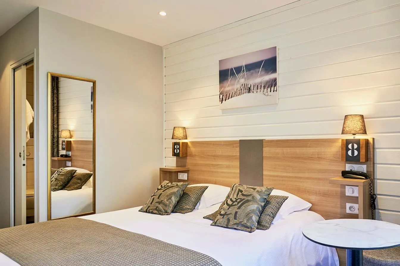 Bed in La Cremaillere Hôtel-Restaurant