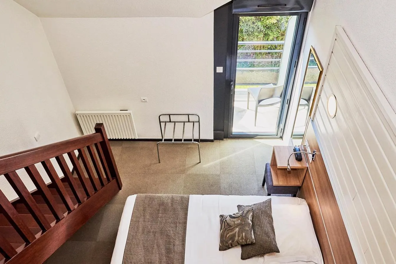 Bed in La Cremaillere Hôtel-Restaurant