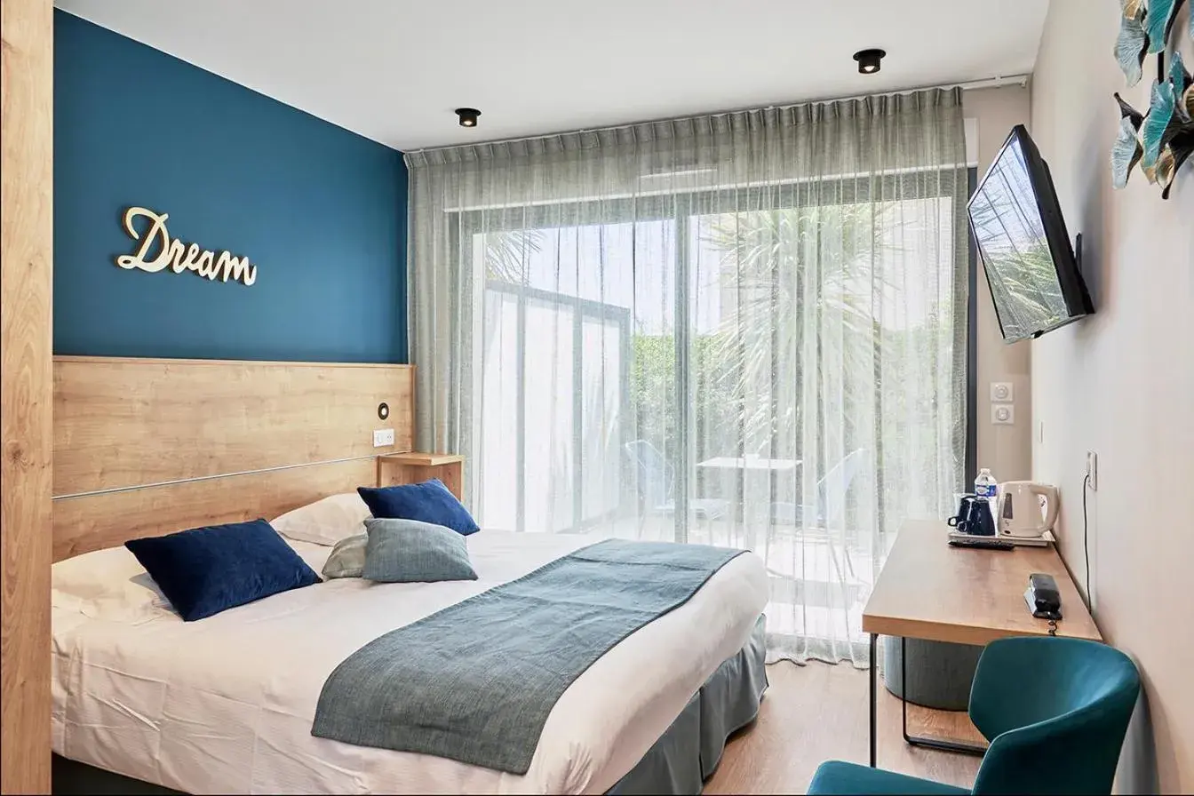 Bed in La Cremaillere Hôtel-Restaurant Bed in La Cremaillere Hôtel-Restaurant