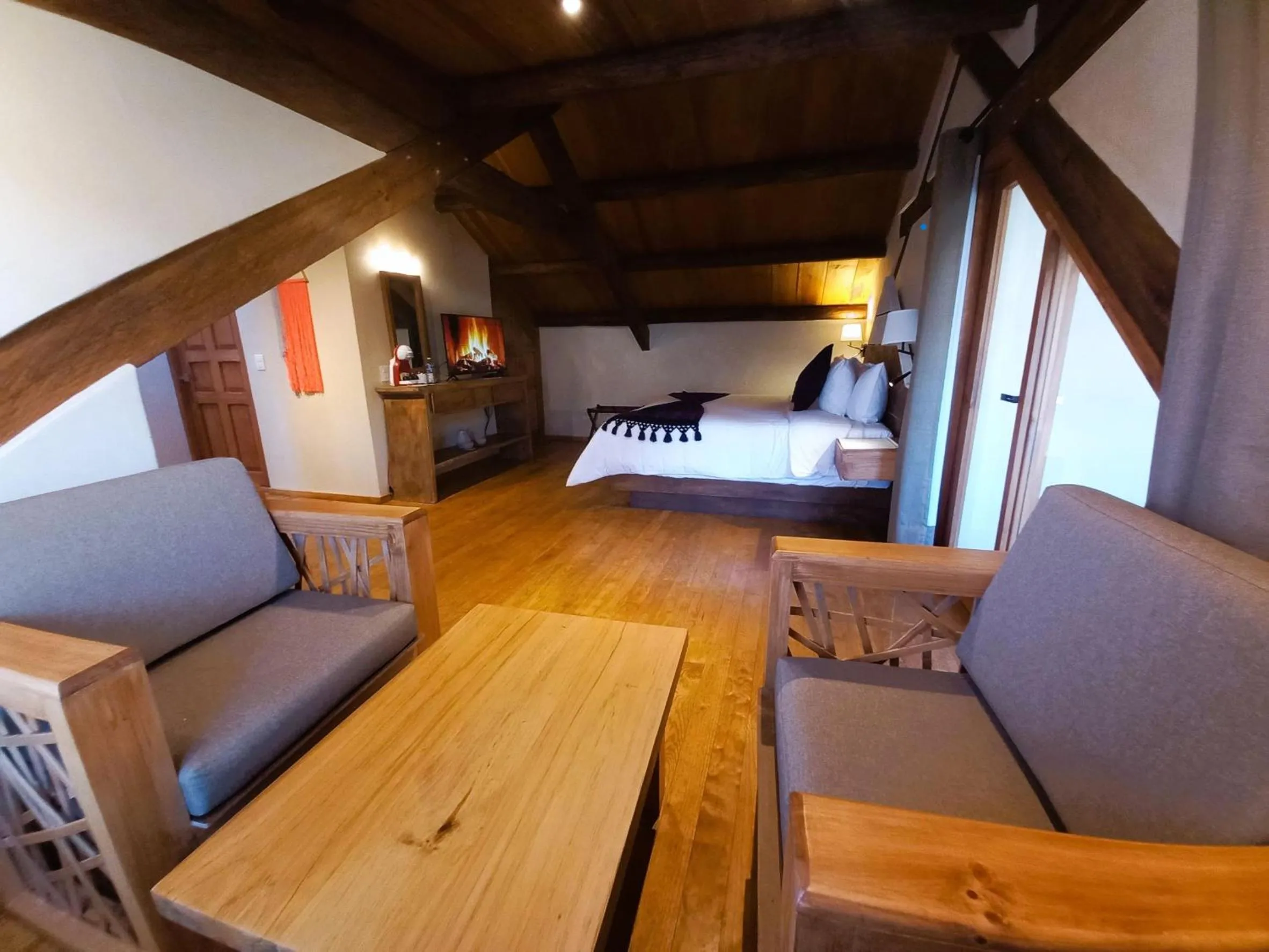 Living room, Bed in Hotel Junvay