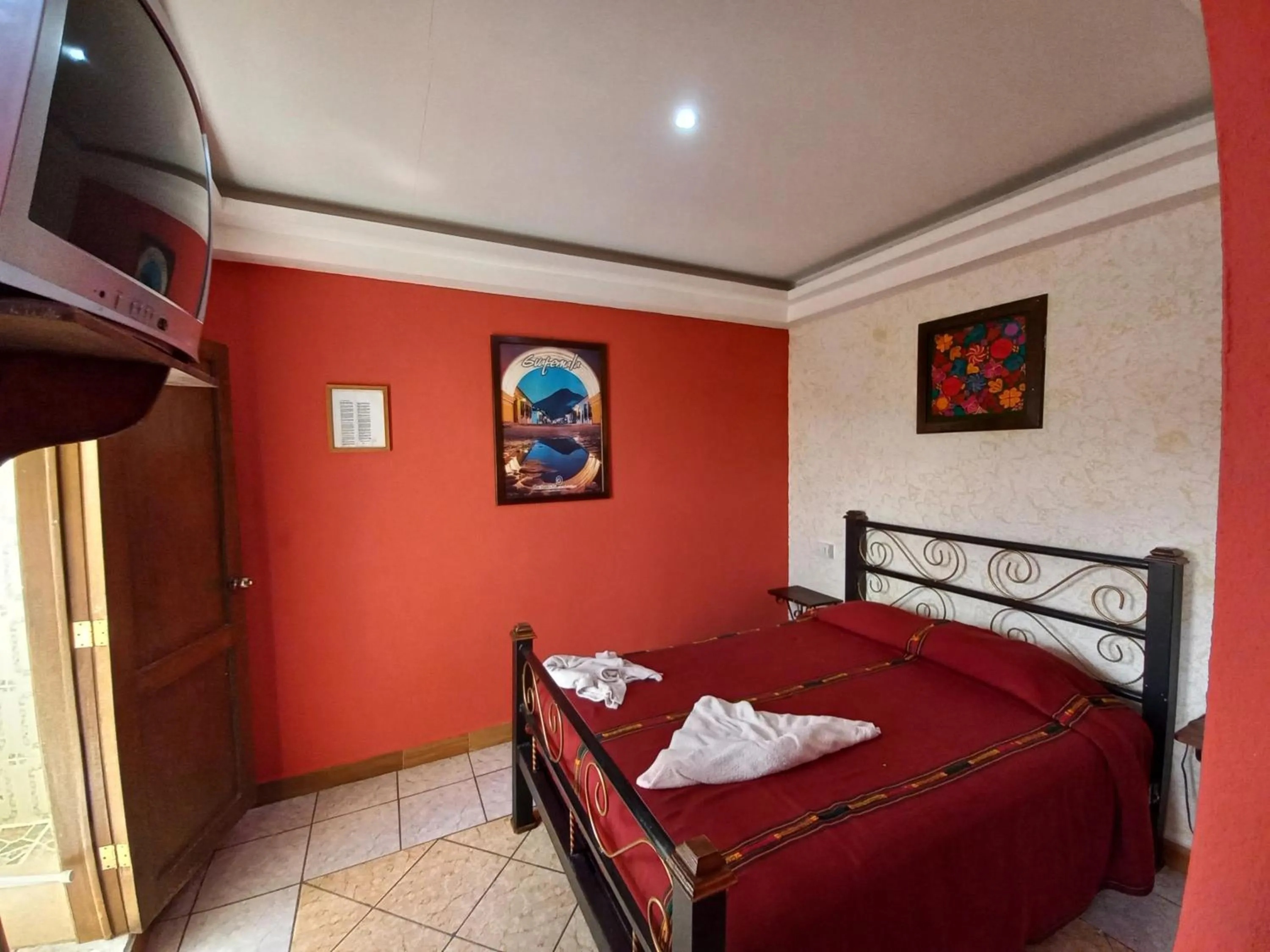 Photo of the whole room, Bed in Hotel Nakbé Atitlán