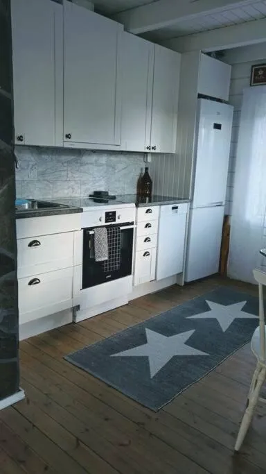 Kitchen or kitchenette in 3 Bedroom Cottage with Sauna by the Sea