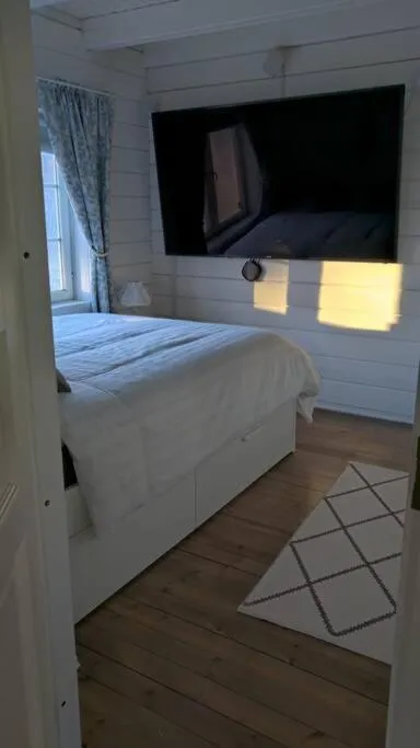 TV and multimedia, Bed in 3 Bedroom Cottage with Sauna by the Sea