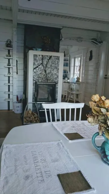 fireplace, Bed in 3 Bedroom Cottage with Sauna by the Sea