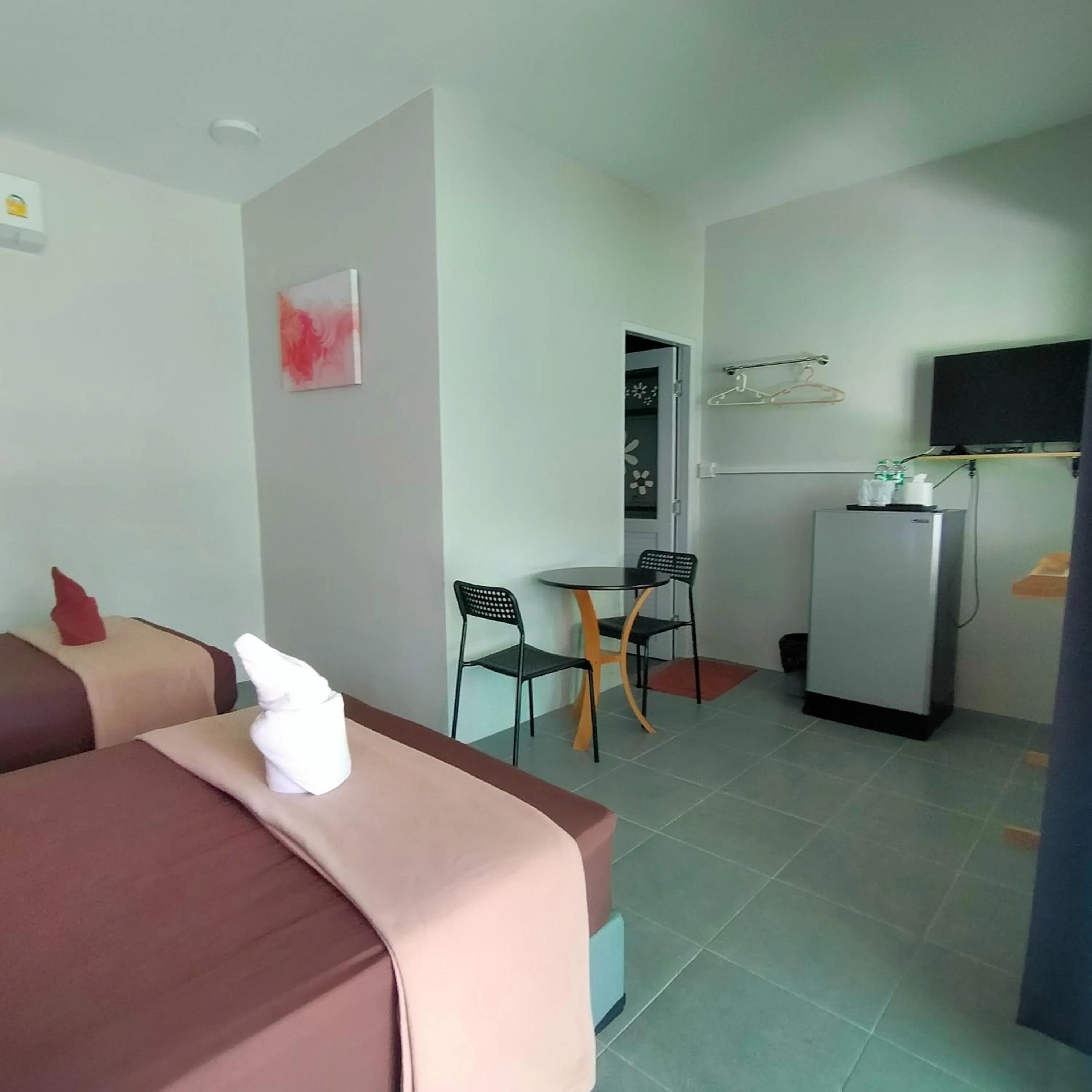 Bed in Davy Cottage Phuket