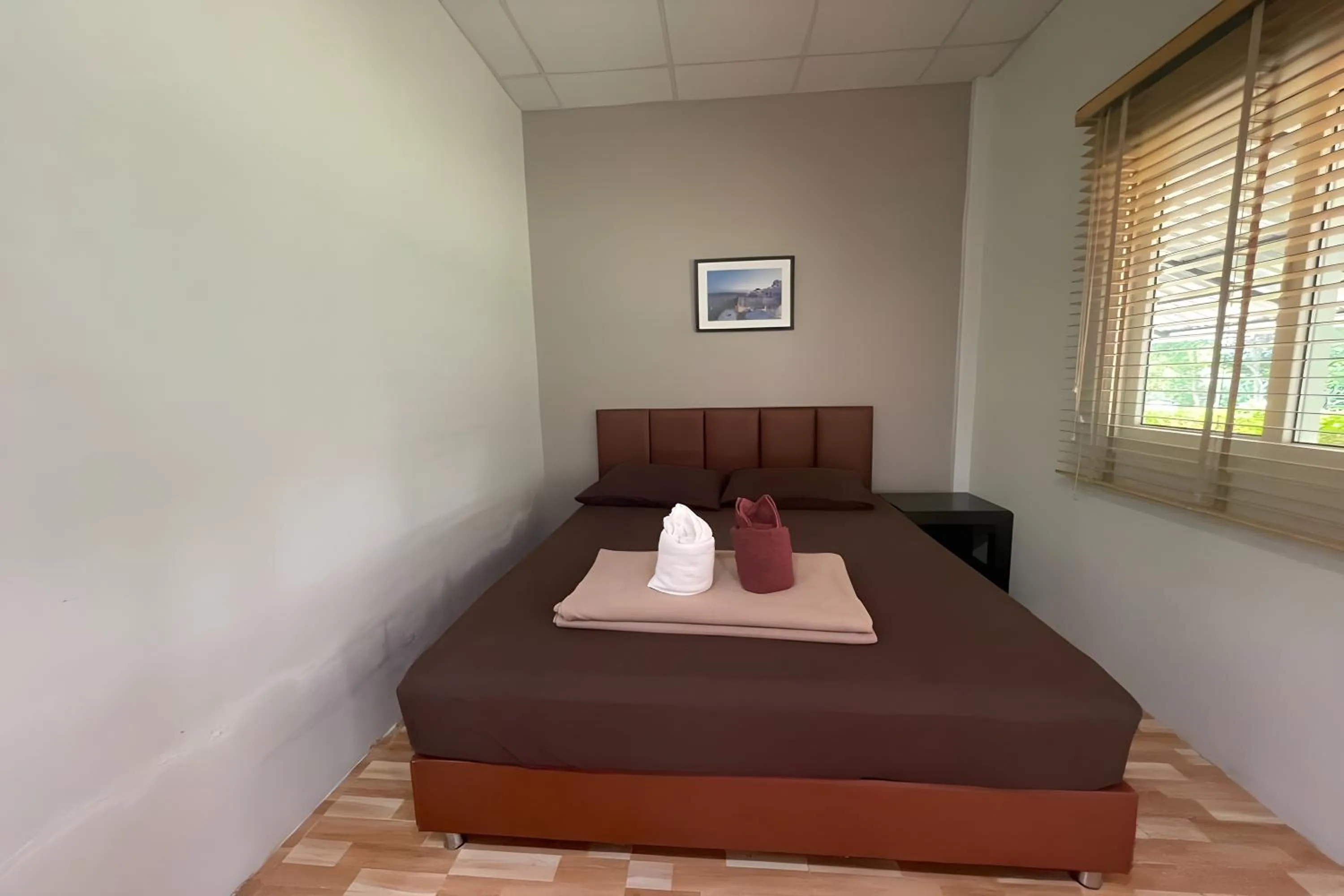 Bed in Davy Cottage Phuket