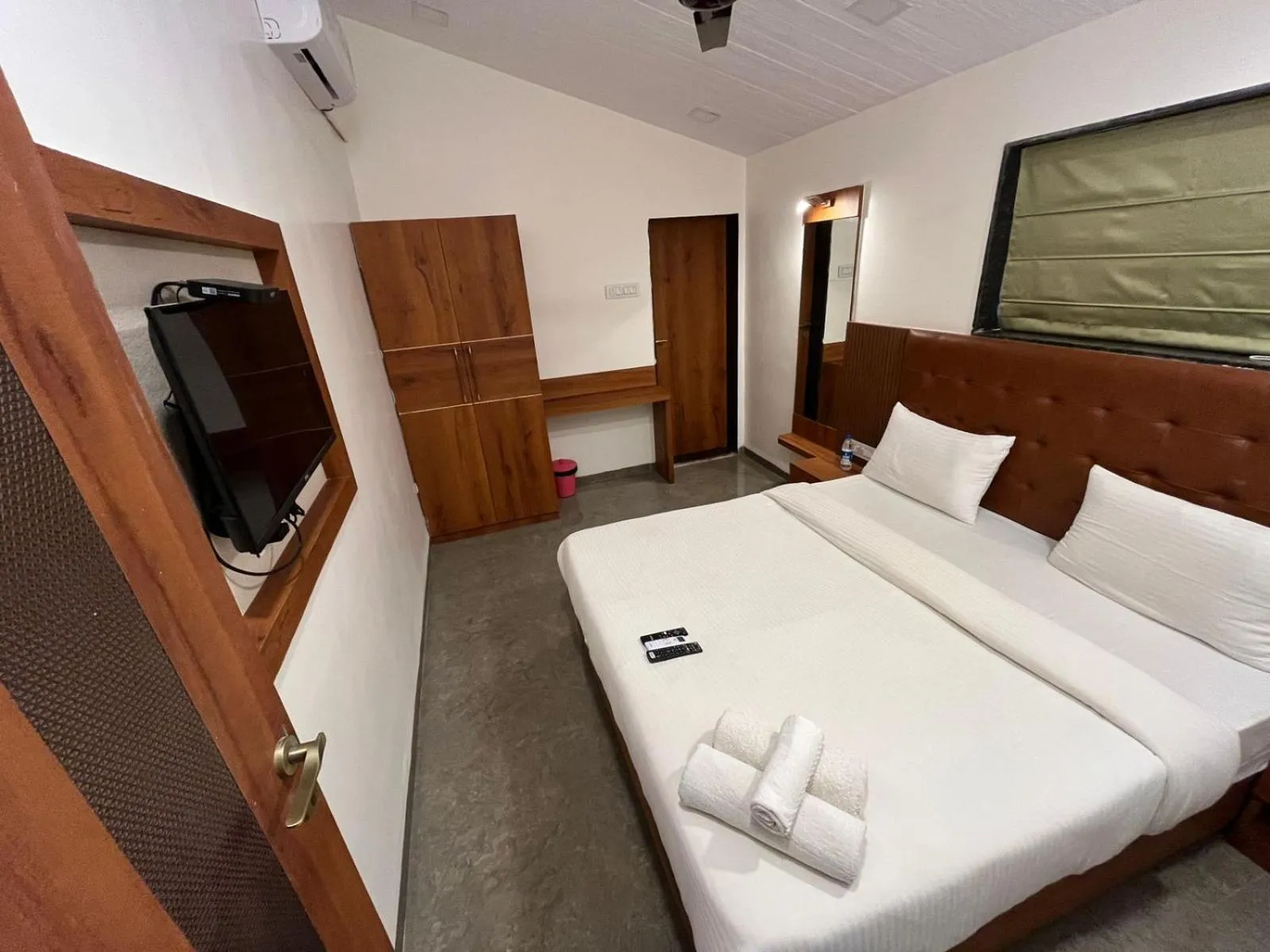 Bed in Khushi Riverside Resort & Spa