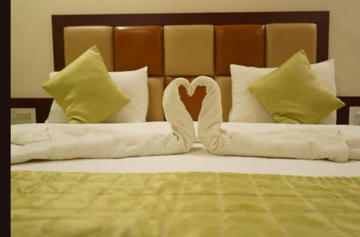 Bed in Khushi Riverside Resort & Spa