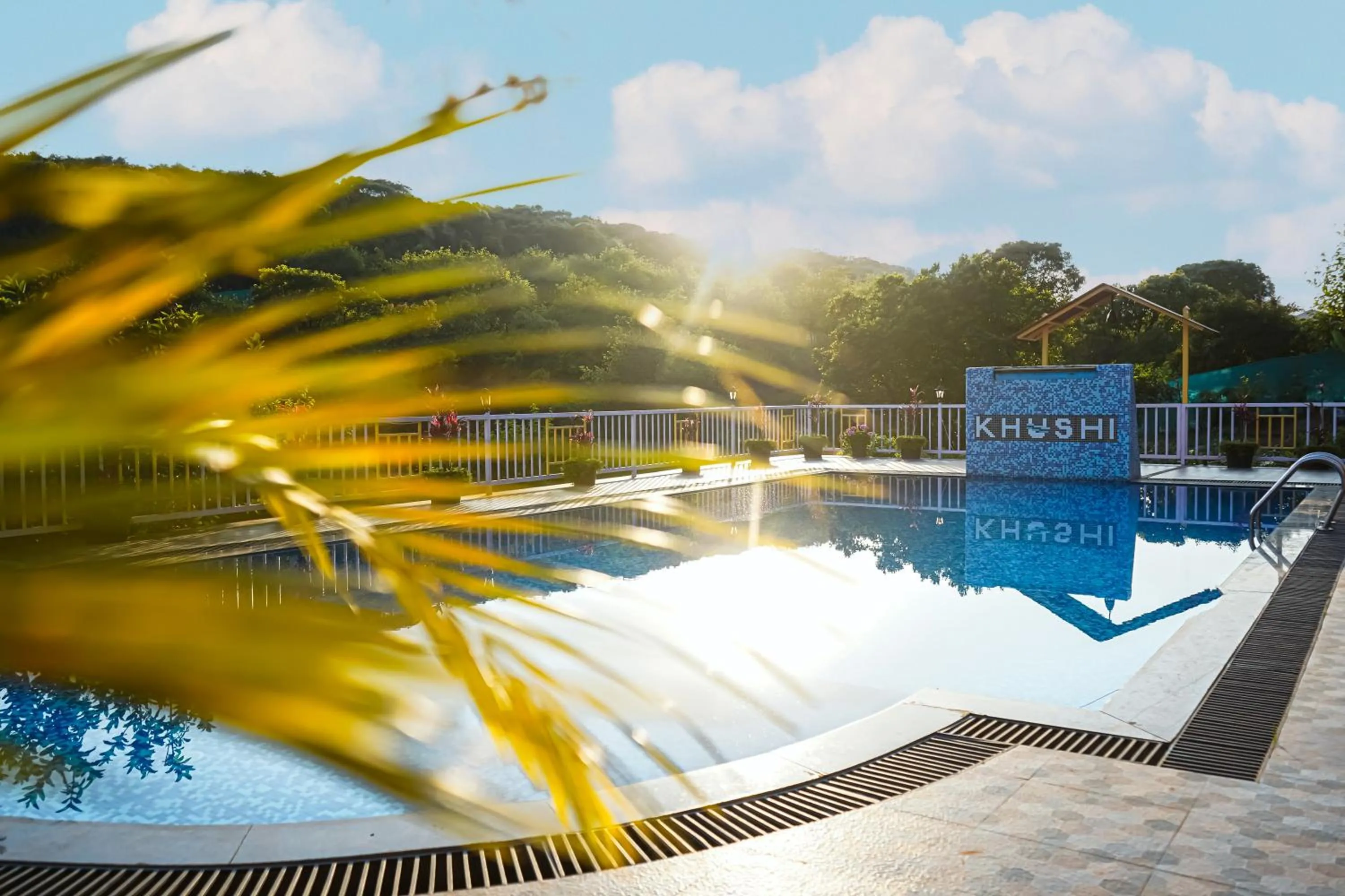 Swimming pool in Khushi Riverside Resort & Spa