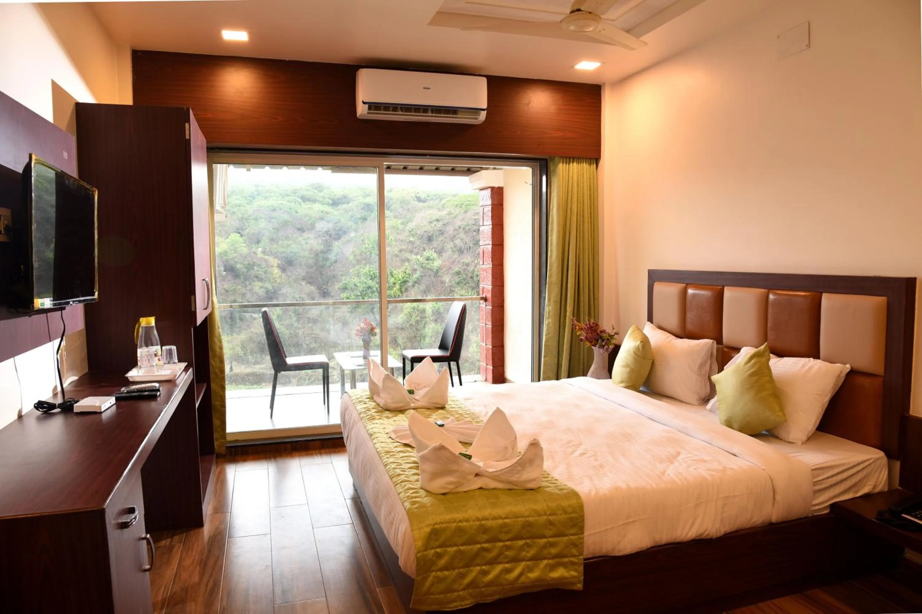 Bed in Khushi Riverside Resort & Spa