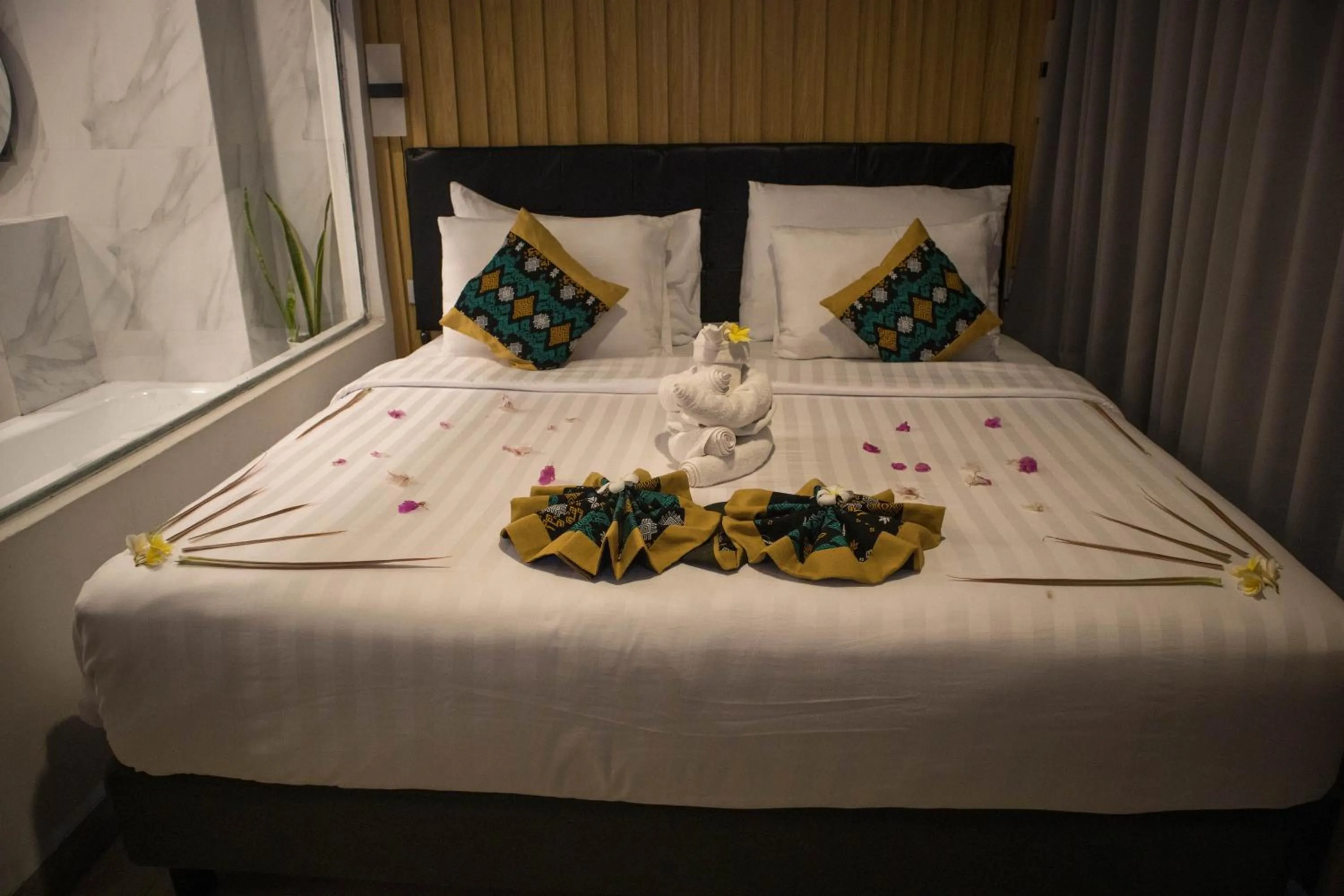 Bed in Raja Hotel Kuta Mandalika Resort & Convention