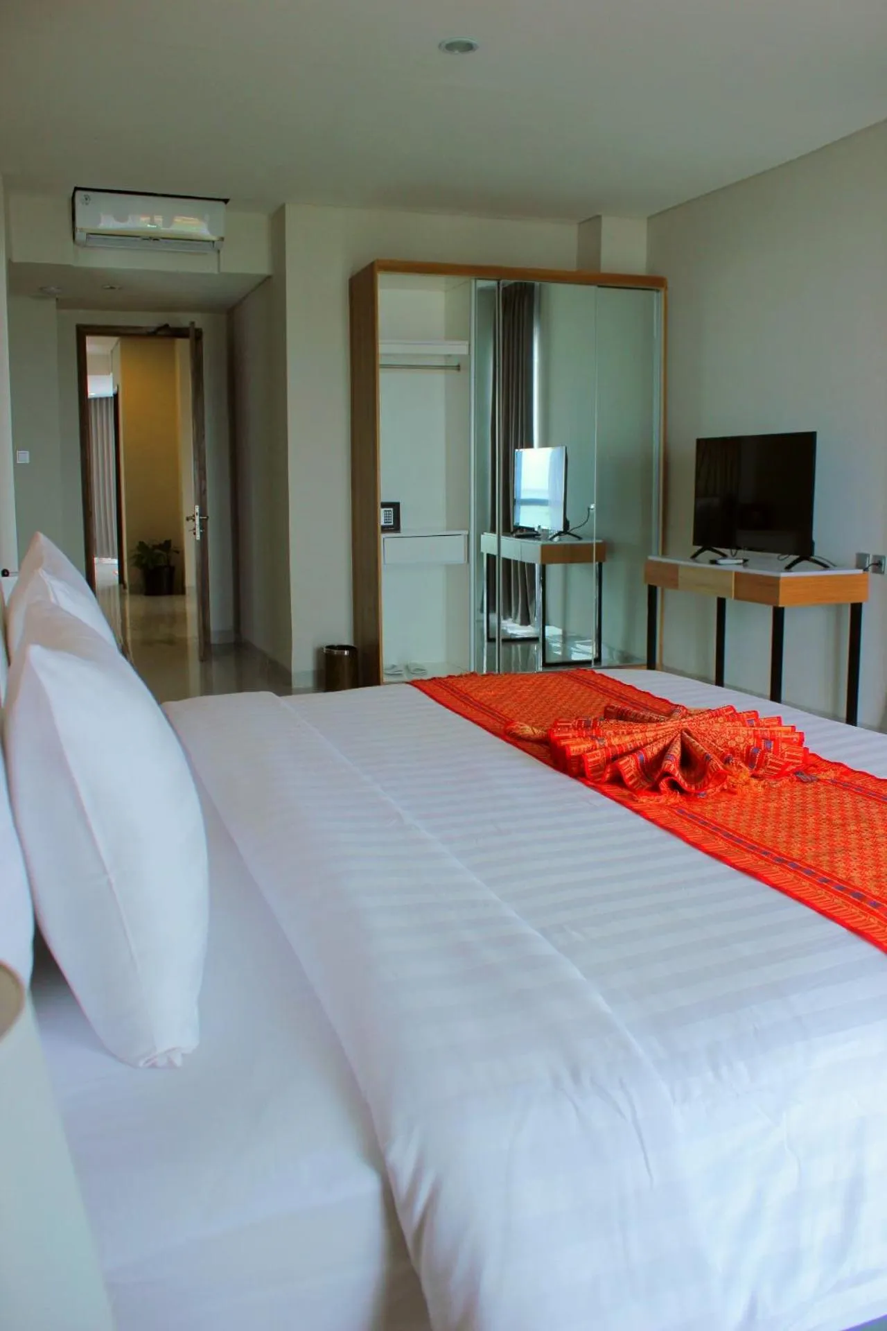 Living room, Bed in Raja Hotel Kuta Mandalika Resort & Convention