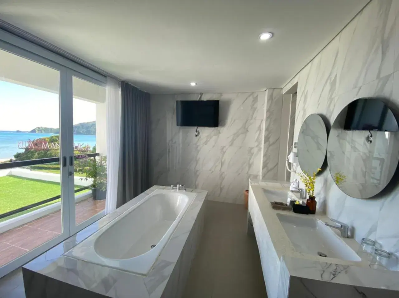 Bathroom in Raja Hotel Kuta Mandalika Resort & Convention Bathroom in Raja Hotel Kuta Mandalika Resort & Convention