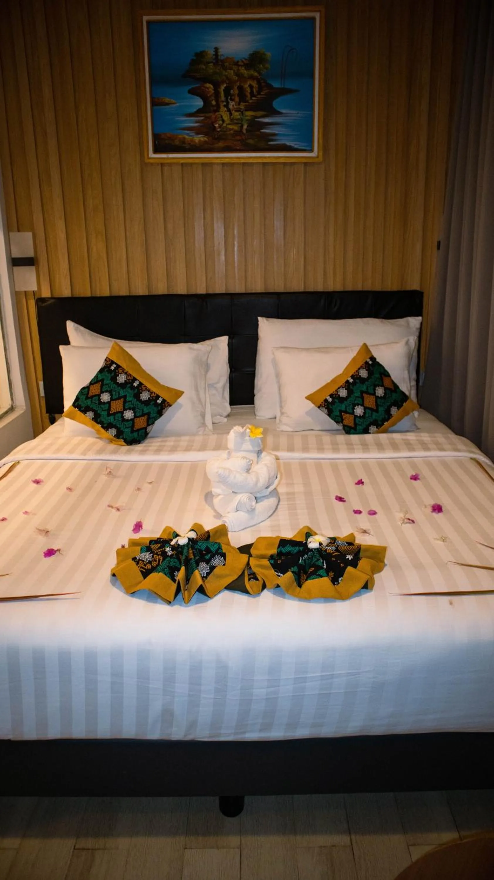 Bed in Raja Hotel Kuta Mandalika Resort & Convention