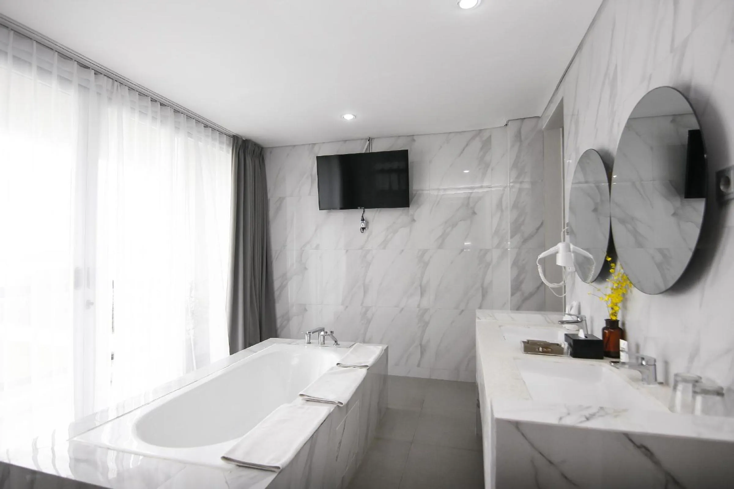 Bathroom in Raja Hotel Kuta Mandalika Resort & Convention