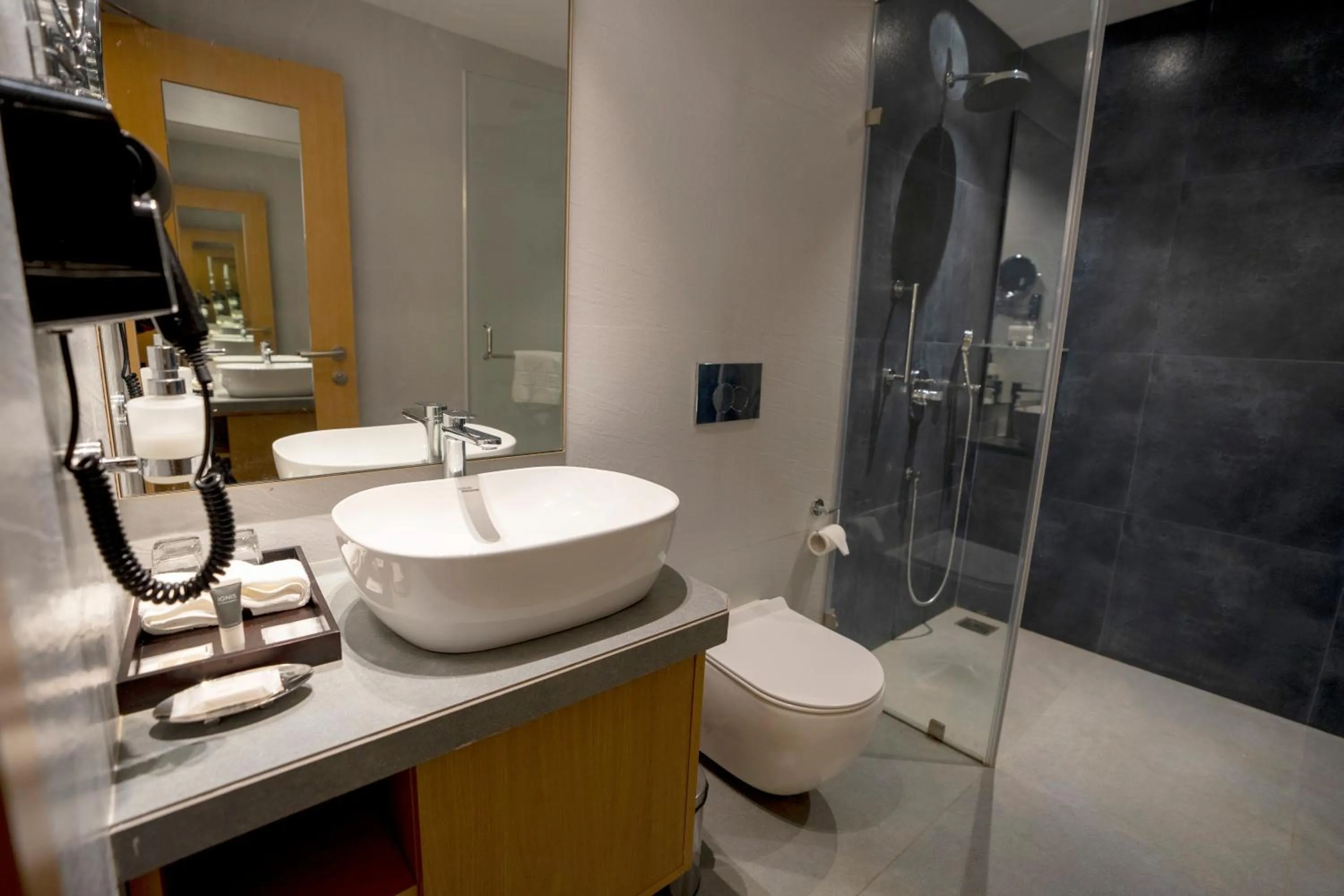 Shower in U Rivergate Resort & Spa, Karjat