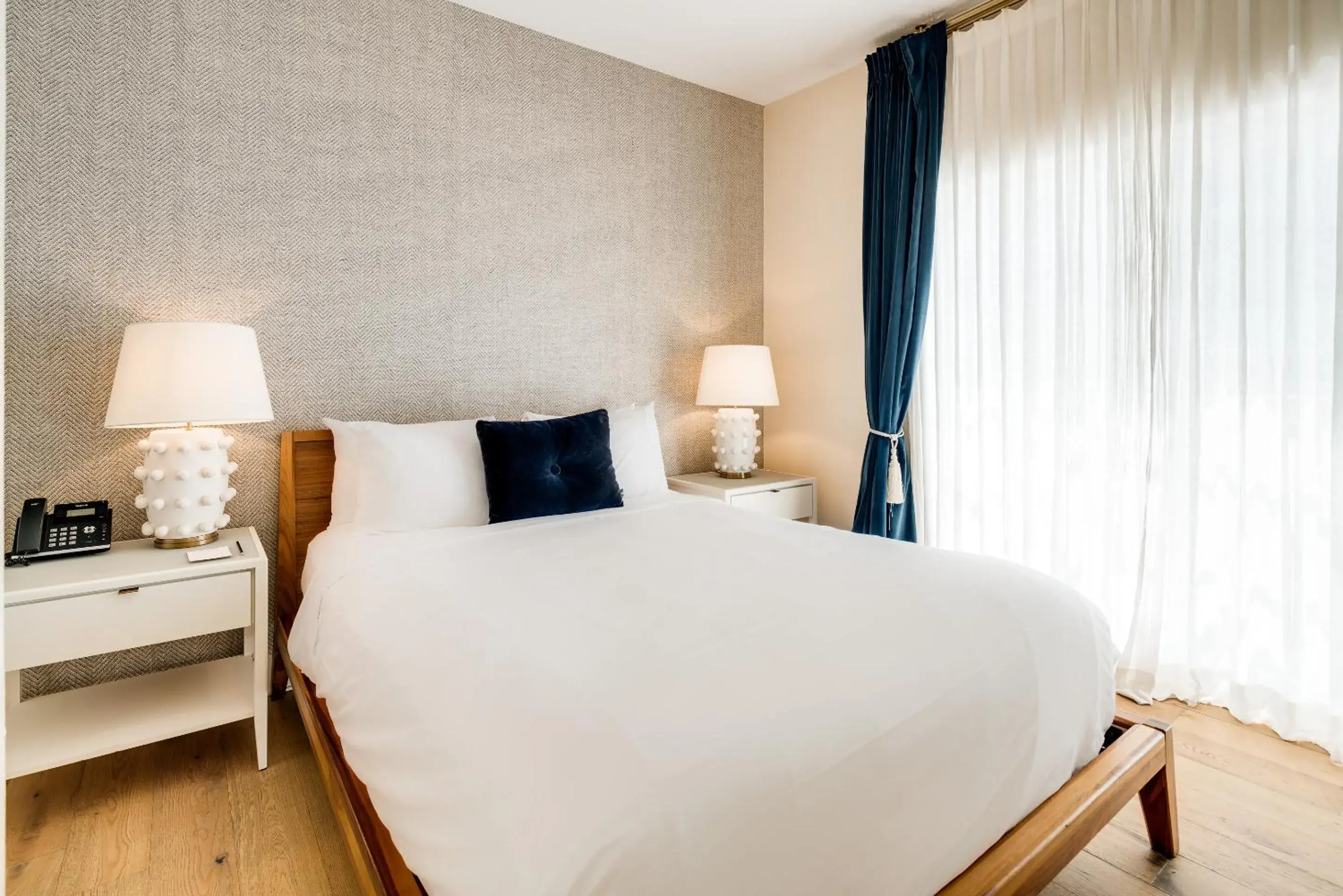 Bed in The Savoy Hotel & Beach Club Bed in The Savoy Hotel & Beach Club