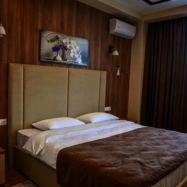 Bed in Lotus Hotel Chisinau