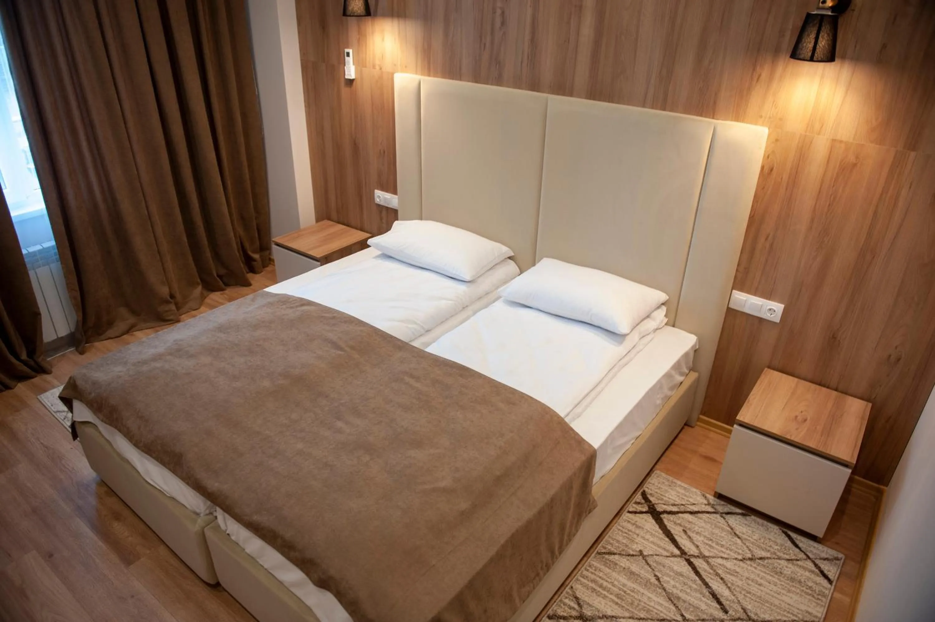 Bed in Lotus Hotel Chisinau