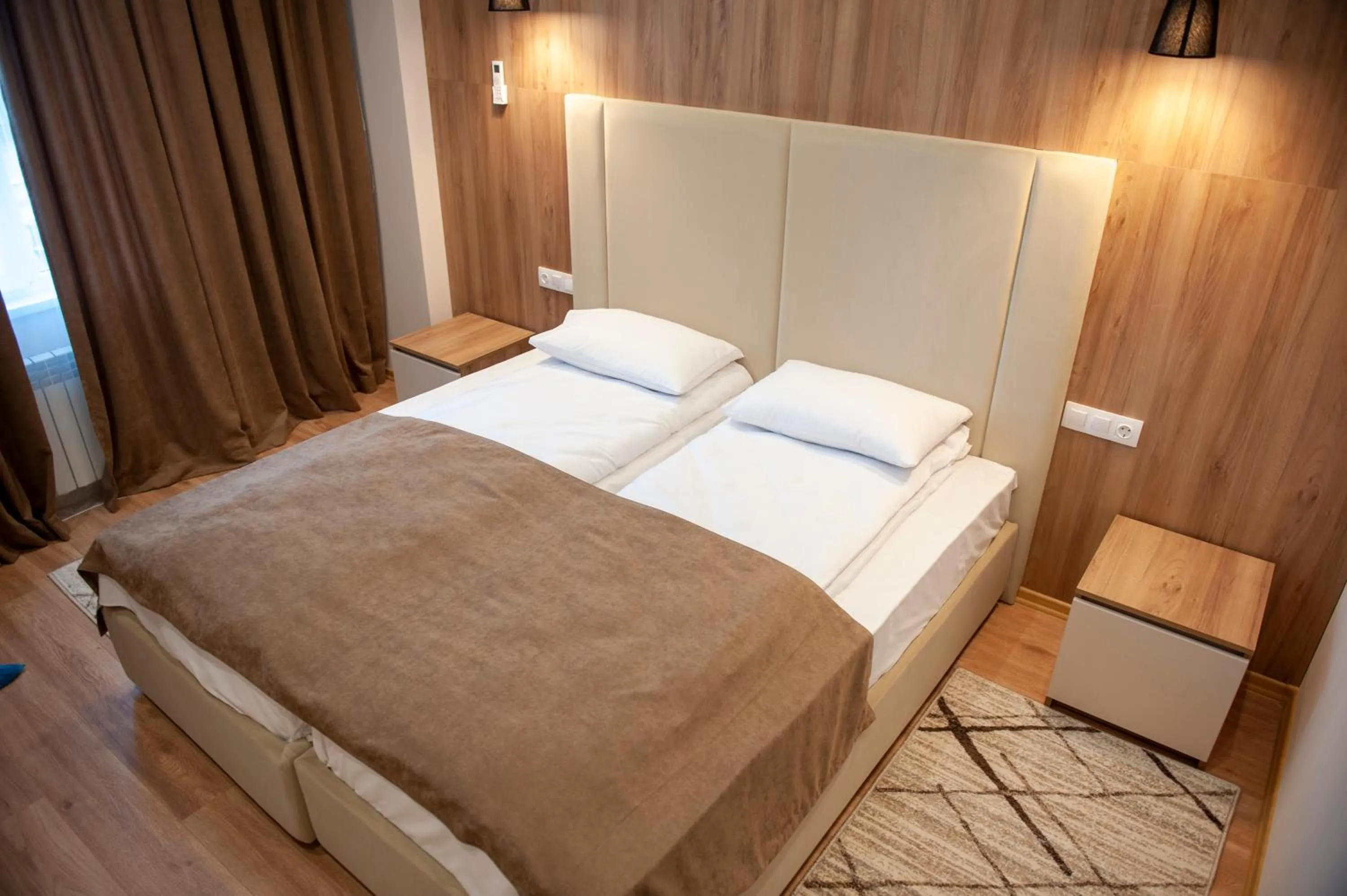 Bed in Lotus Hotel Chisinau