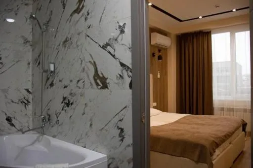 Bed in Lotus Hotel Chisinau