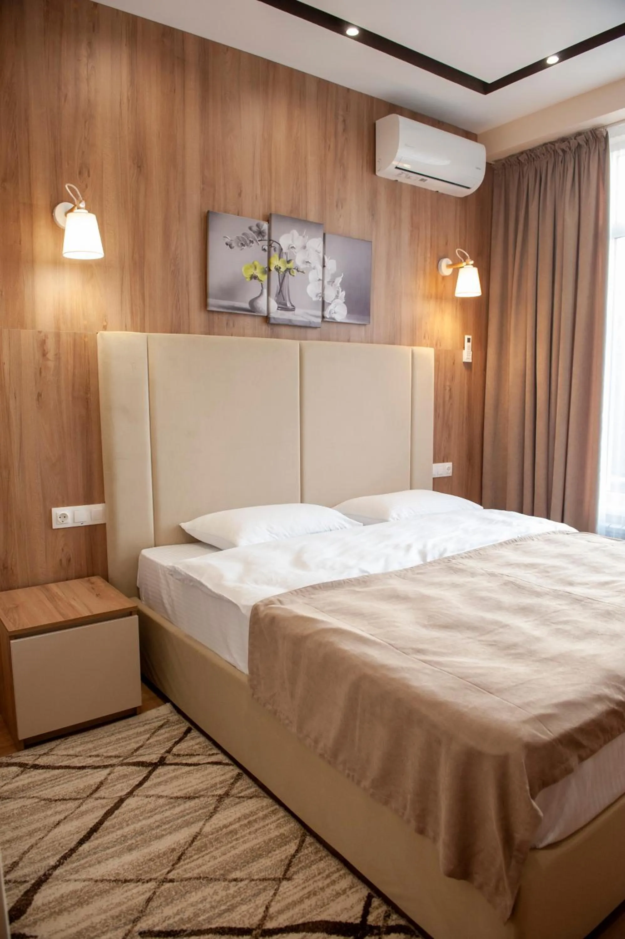 Bed in Lotus Hotel Chisinau