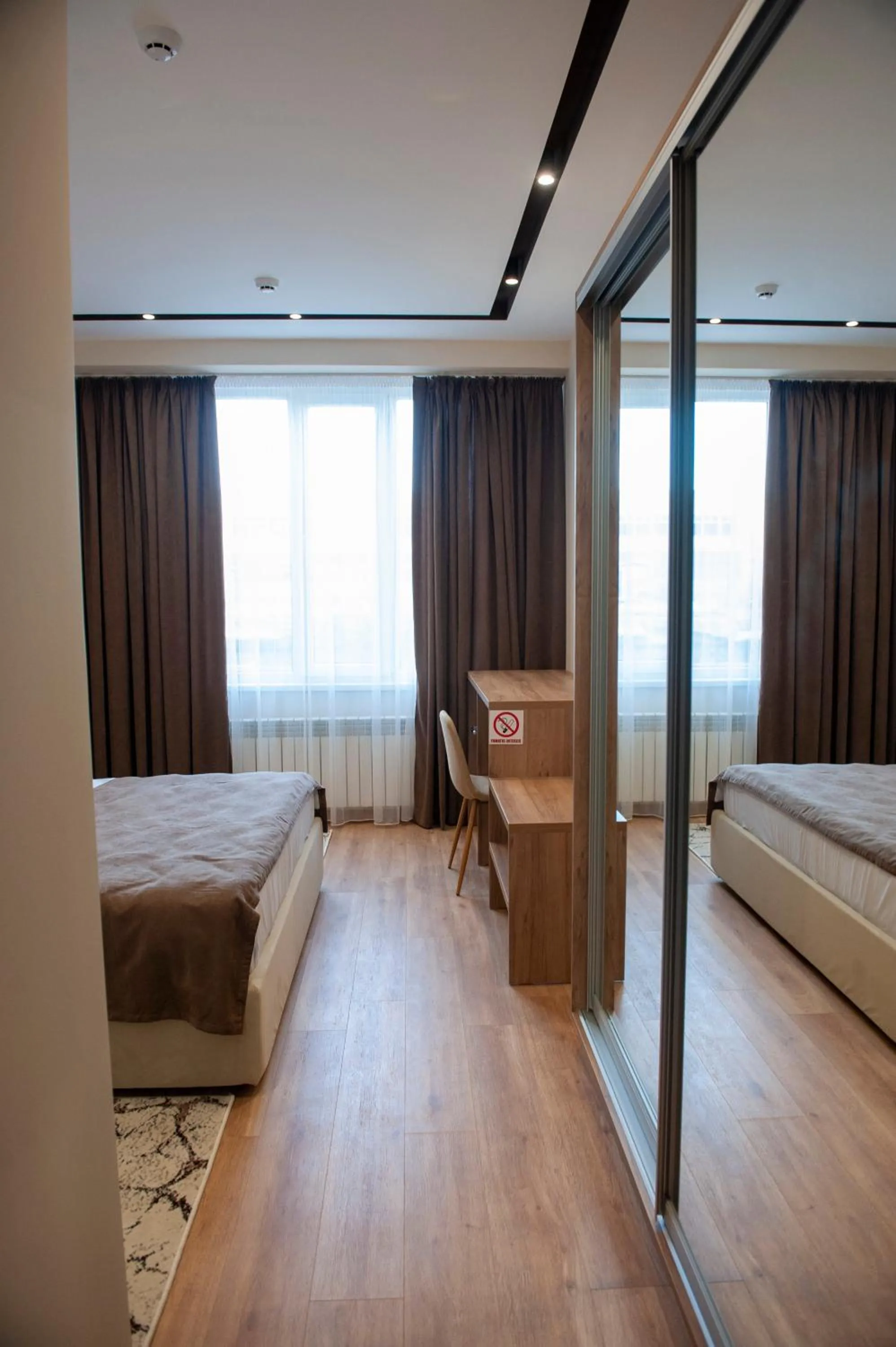 Bed in Lotus Hotel Chisinau
