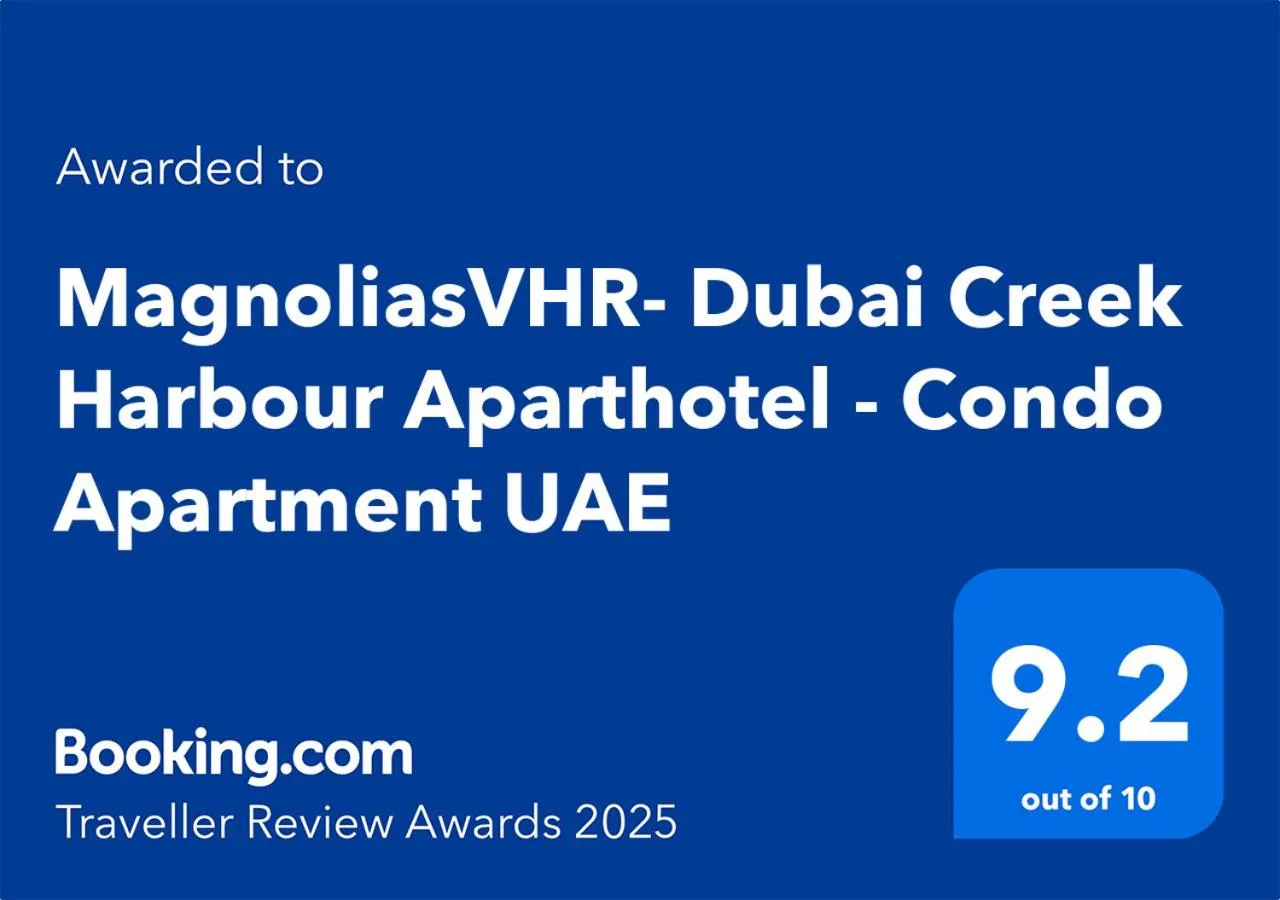 Logo/Certificate/Sign in 3BR Haven with Burj Views by MagnoliasVHR