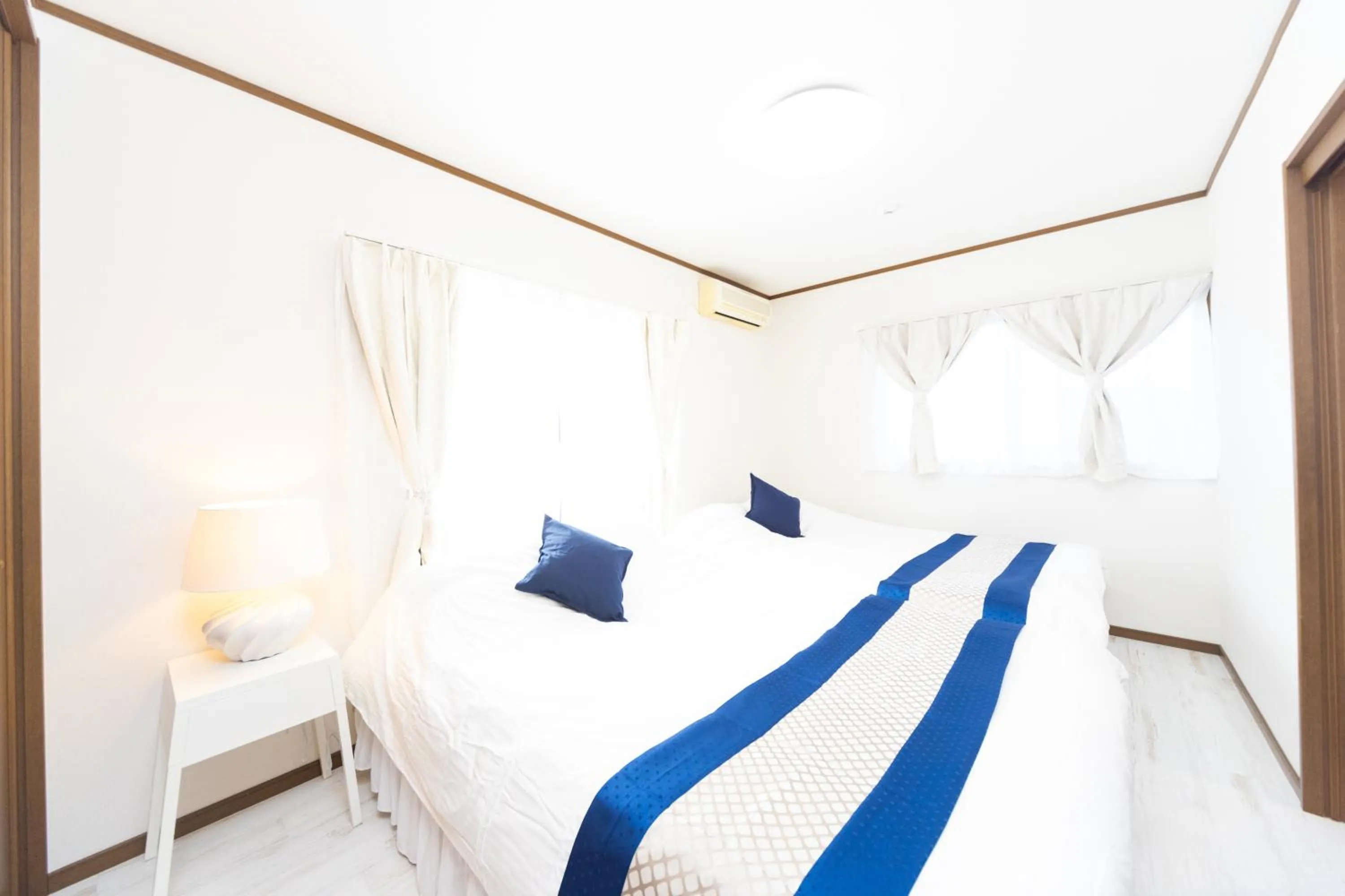 Bed in Awaji Garden House in Shinmura