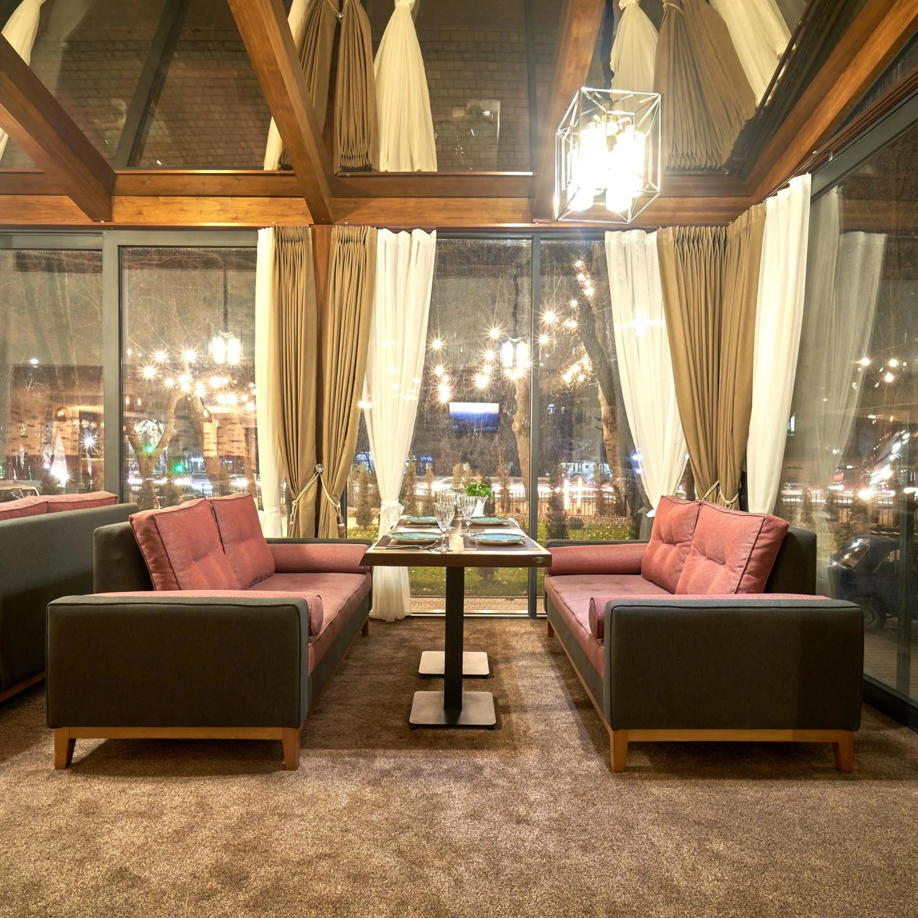 Seating area in Asli Makon Hotel