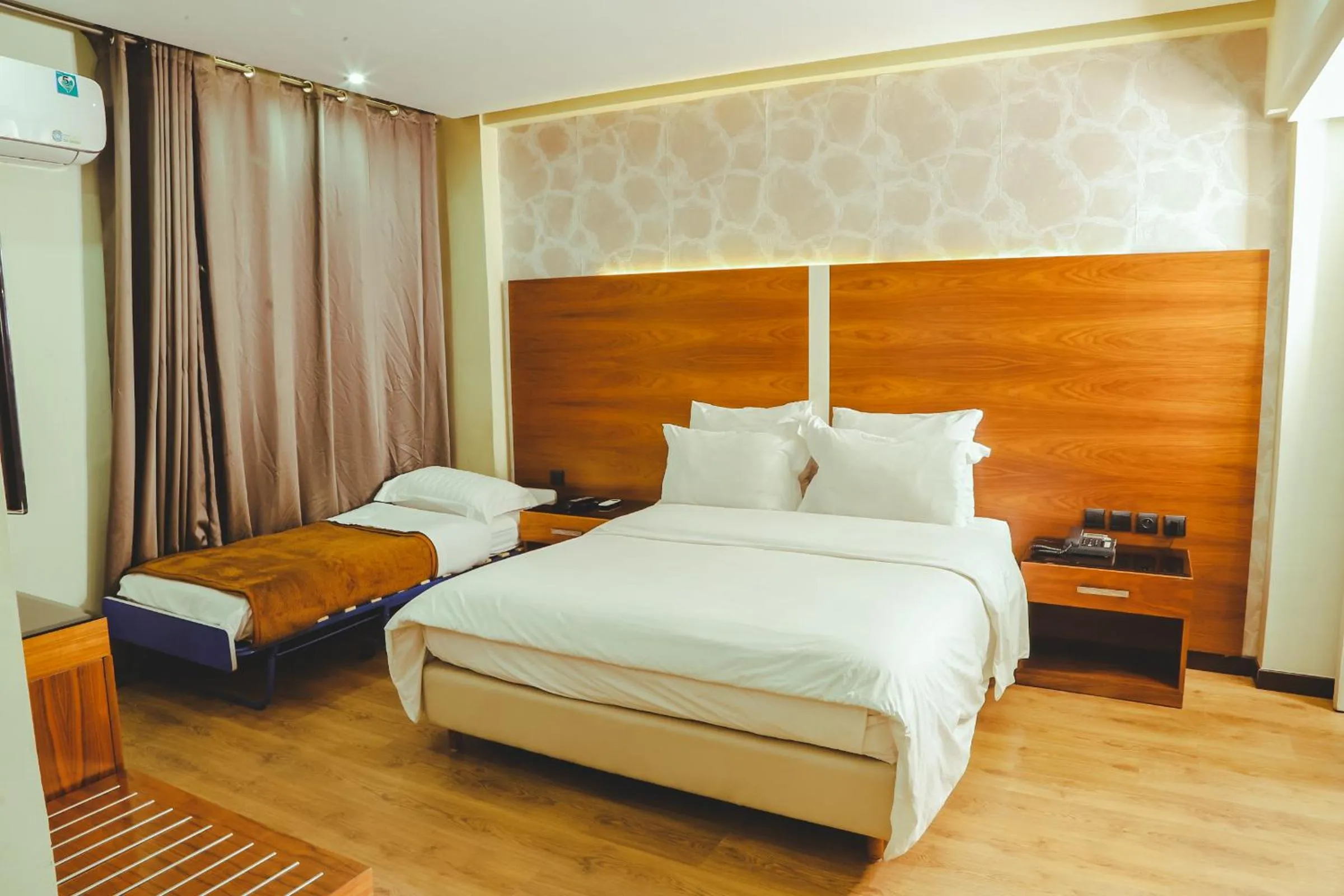 Bed in Hotel Perce Neige