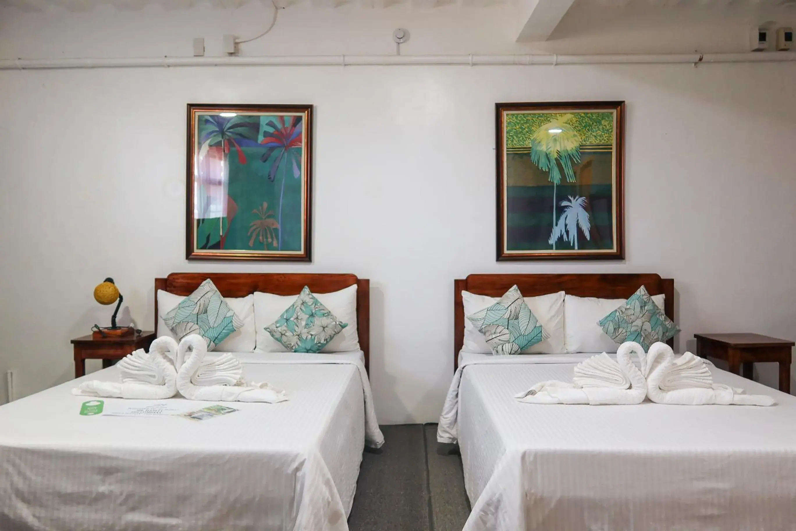 Deluxe Queen Room with Two Queen Beds in AV Suites Deluxe Queen Room with Two Queen Beds in AV Suites