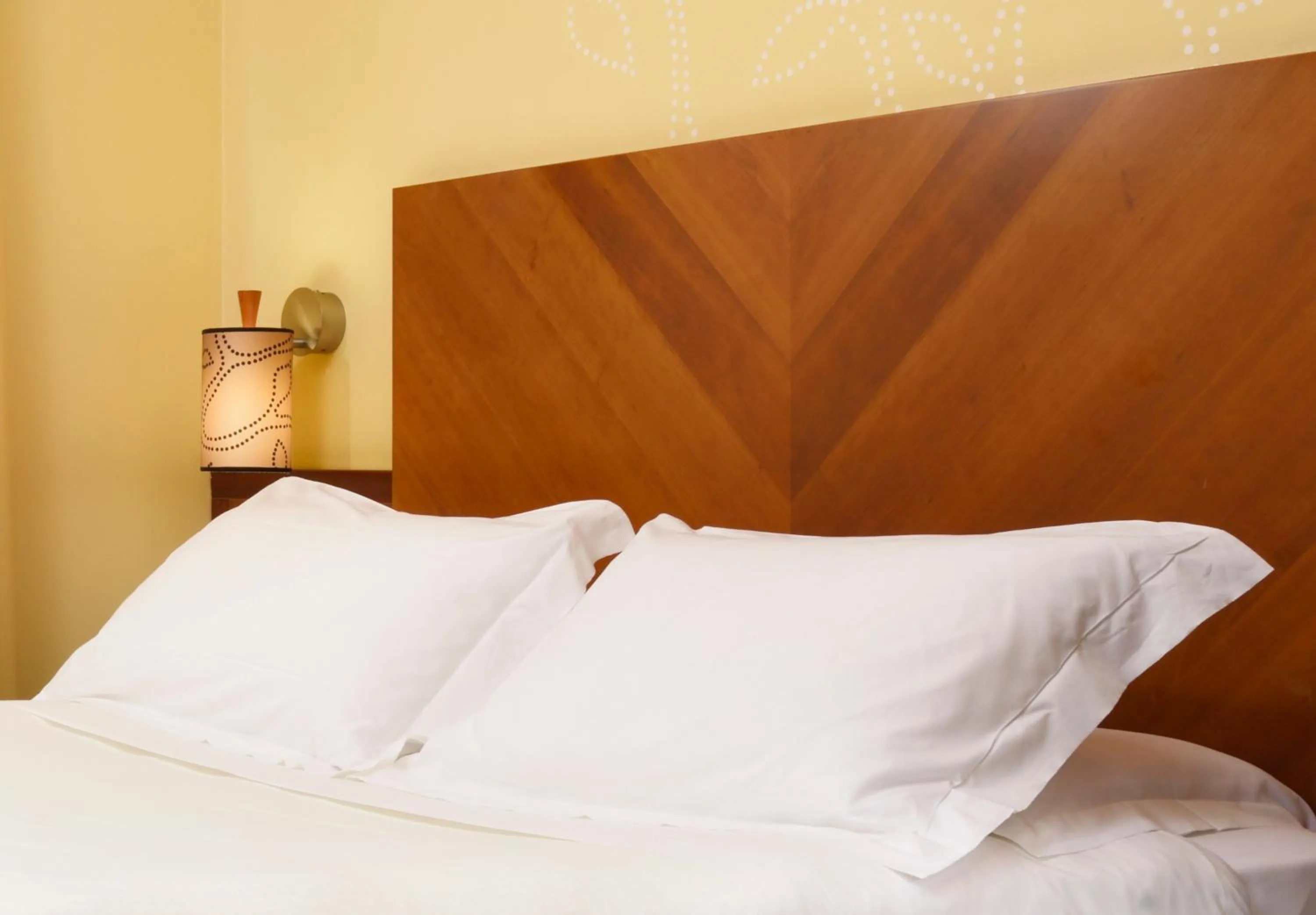 Bedroom, Bed in UNA Hotels Mediterraneo Milano