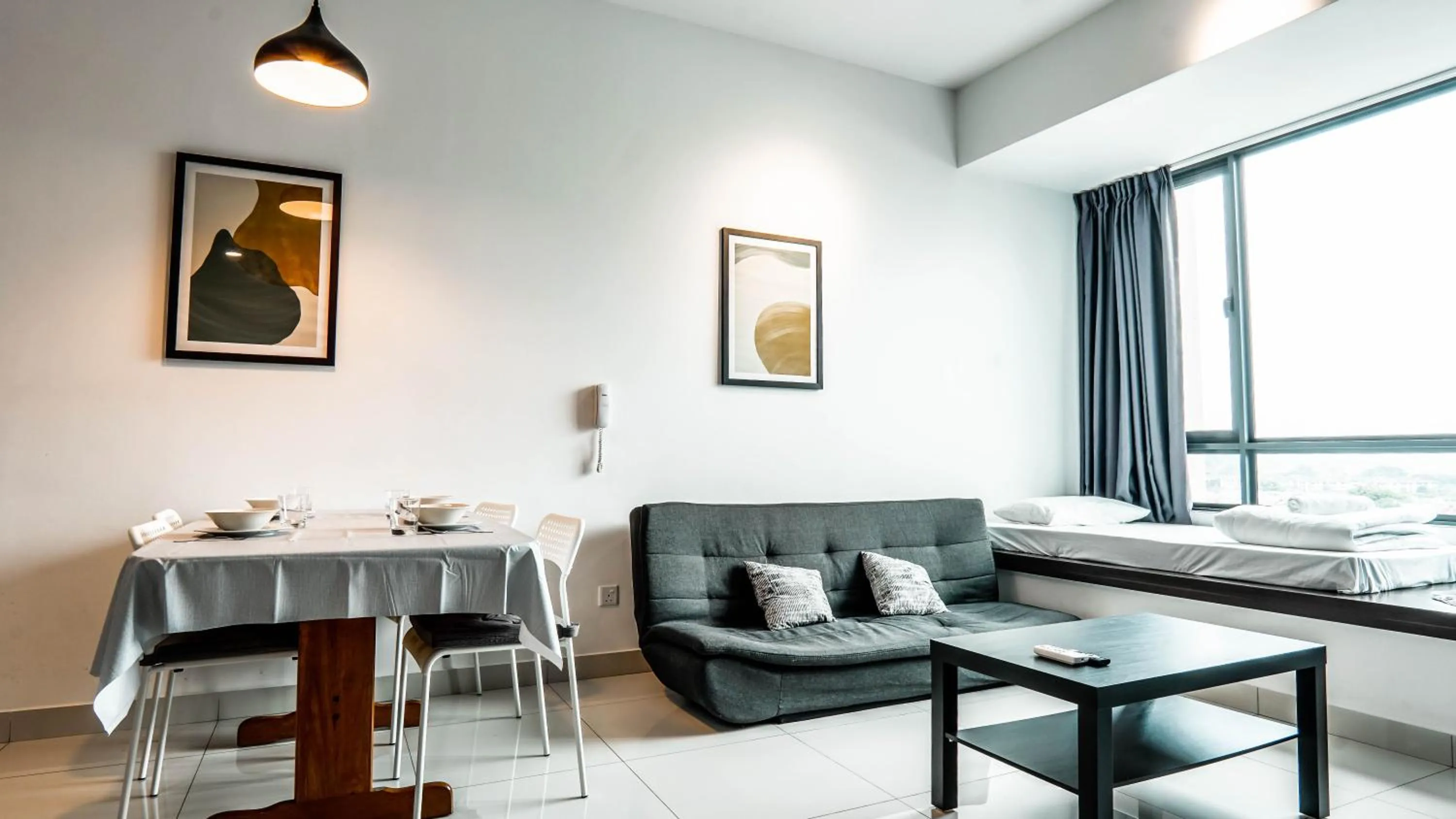 Living room in Greenfield Residence Bandar Sunway by Airhost