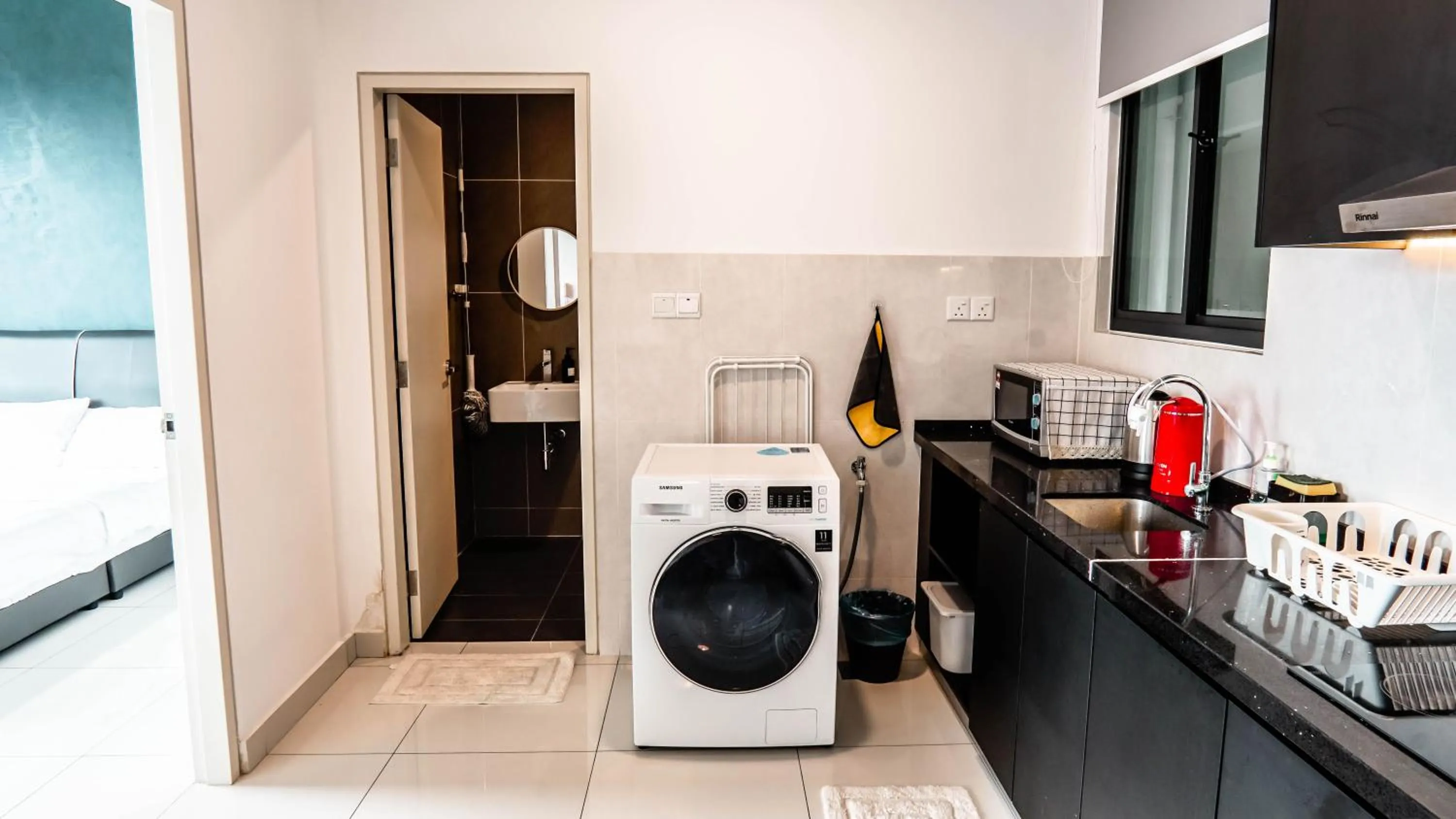 Kitchen or kitchenette in Greenfield Residence Bandar Sunway by Airhost