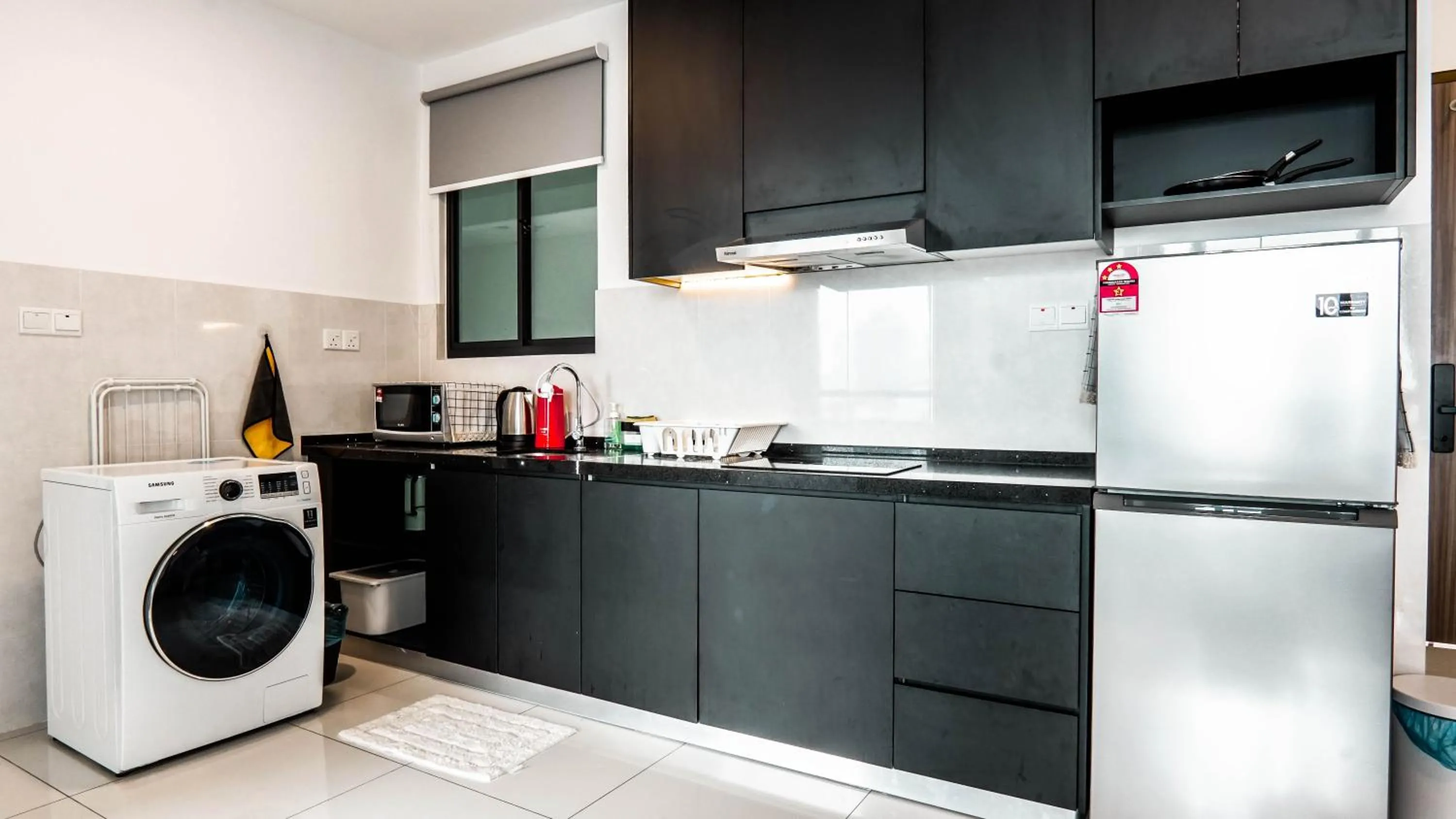 Kitchen or kitchenette in Greenfield Residence Bandar Sunway by Airhost