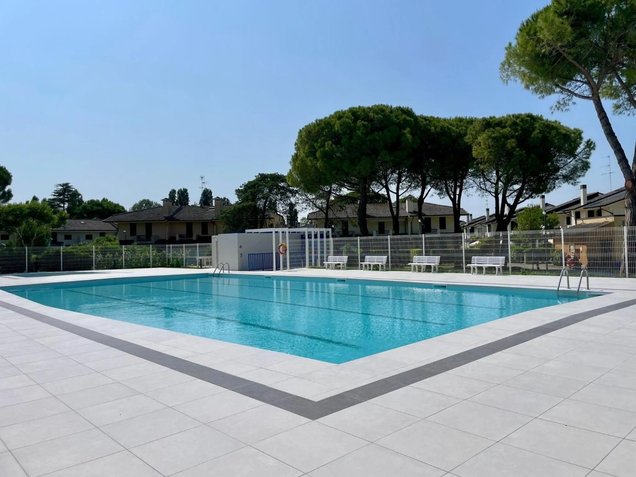 Swimming pool in Colorful house with pool and garden