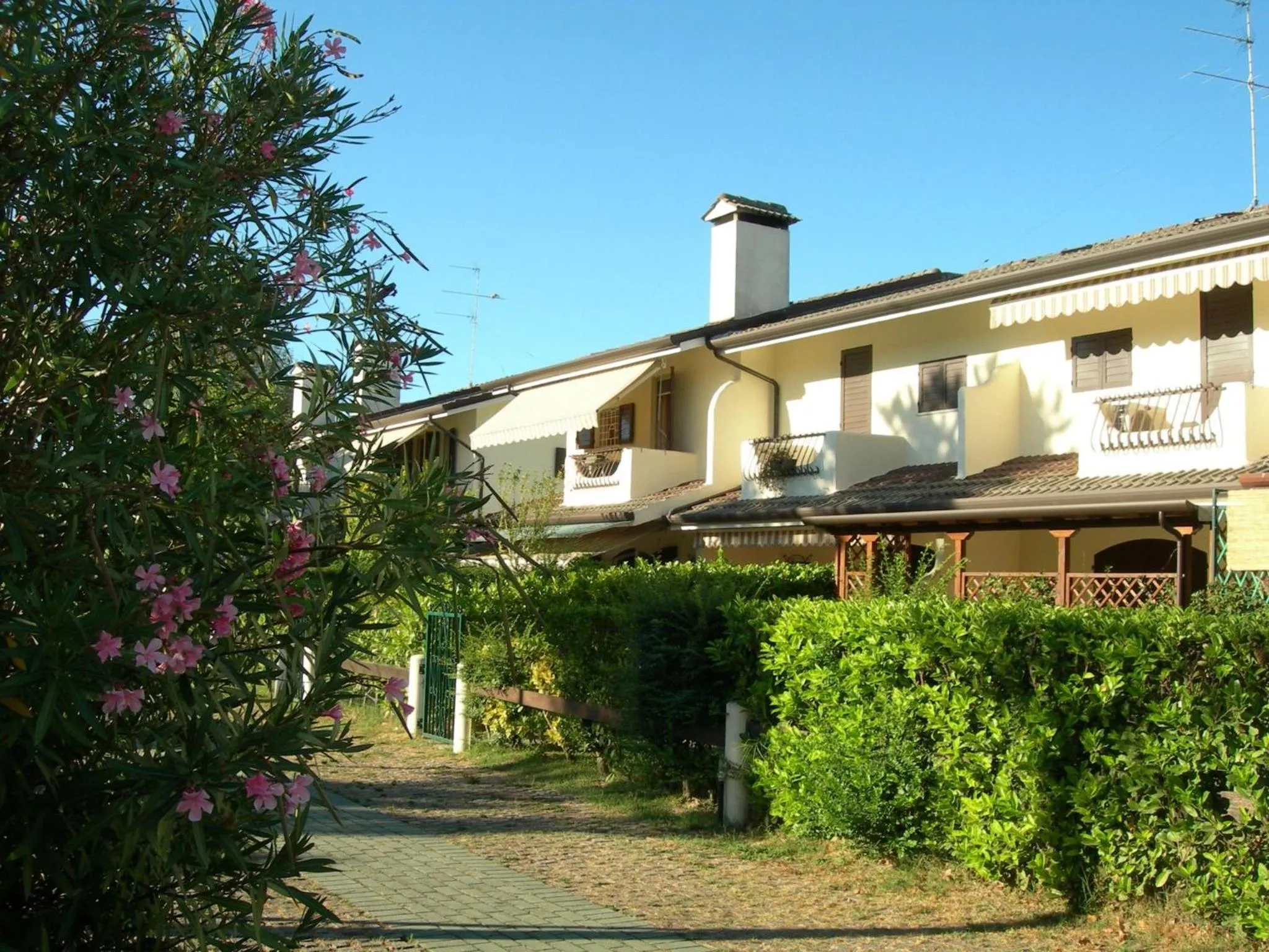 Neighbourhood in Colorful house with pool and garden