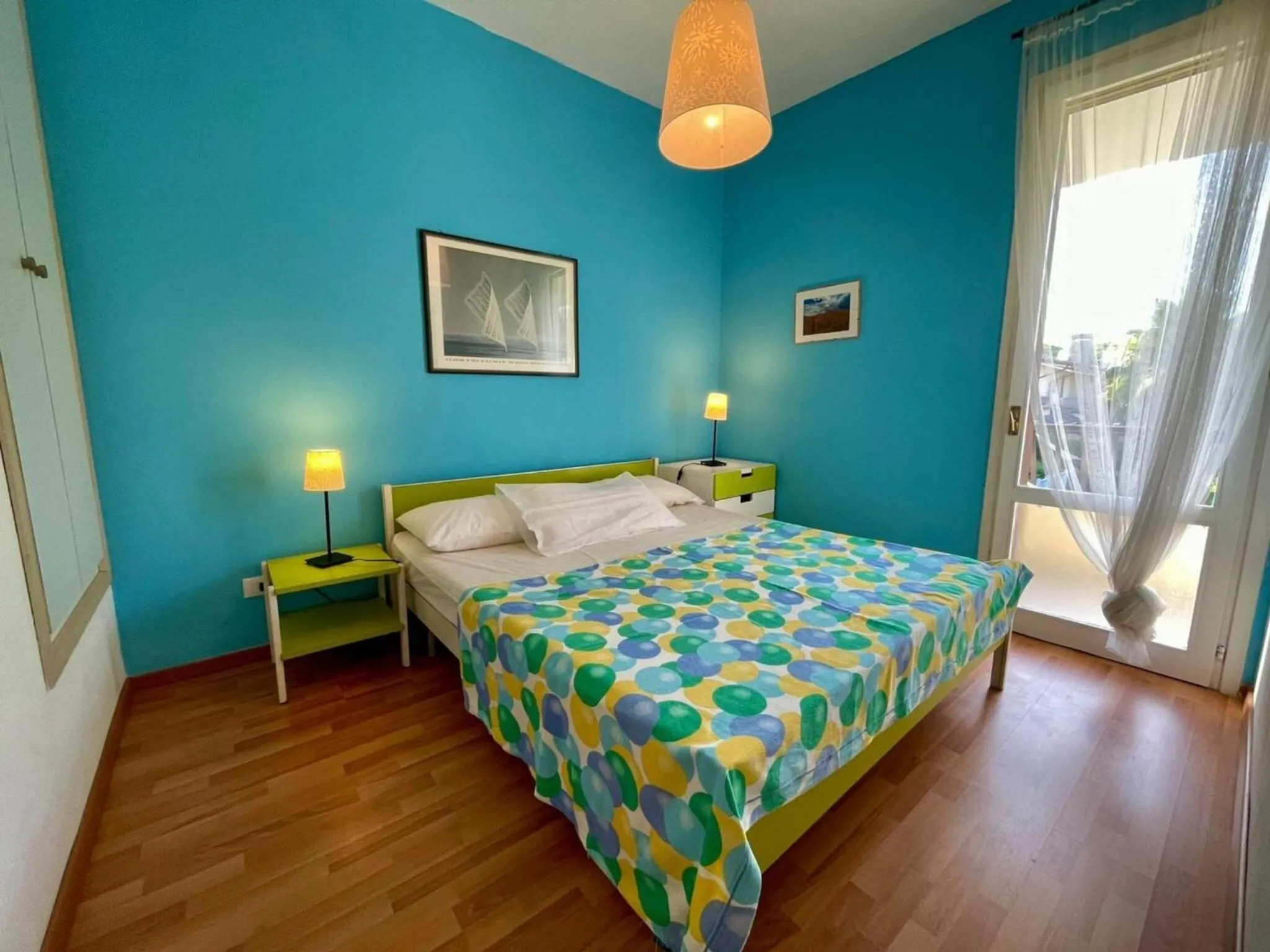 Bed in Colorful house with pool and garden