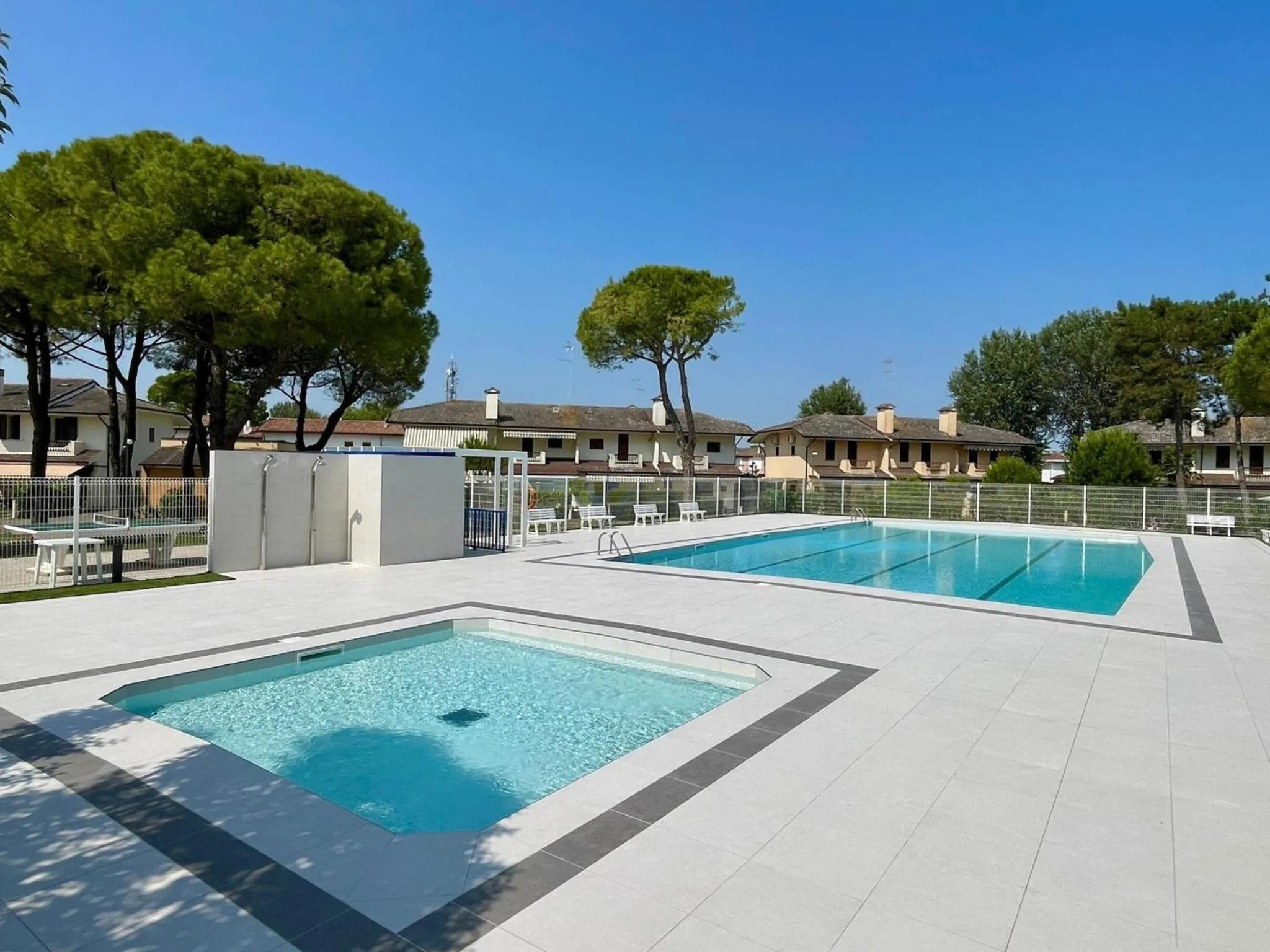 Swimming pool in Colorful house with pool and garden