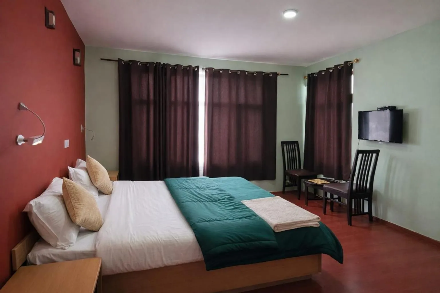 Bed in Hotel Malik Residency