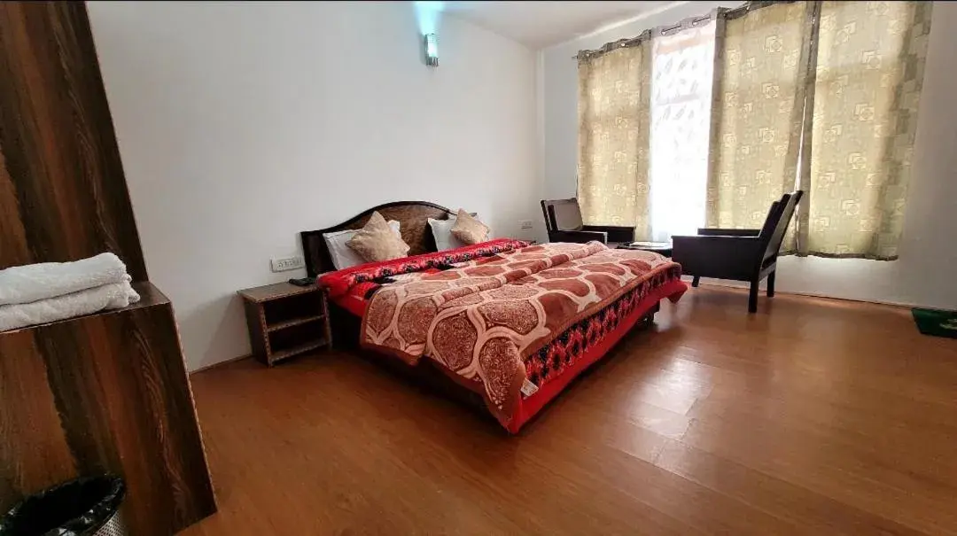 Bed in Hotel Malik Residency Bed in Hotel Malik Residency